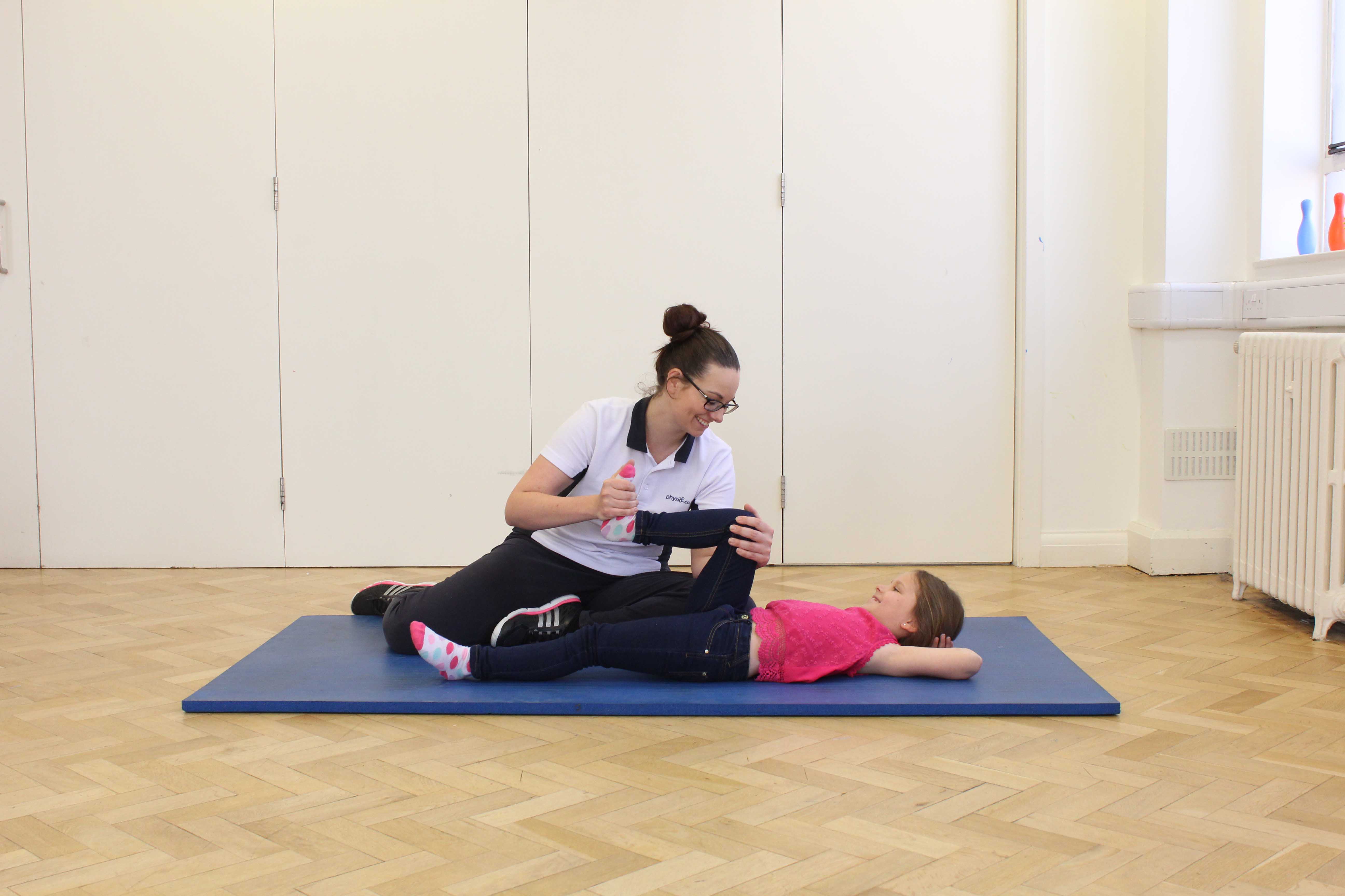 Mobilisation and stretch exercises applied by a paediatric physiotherapist