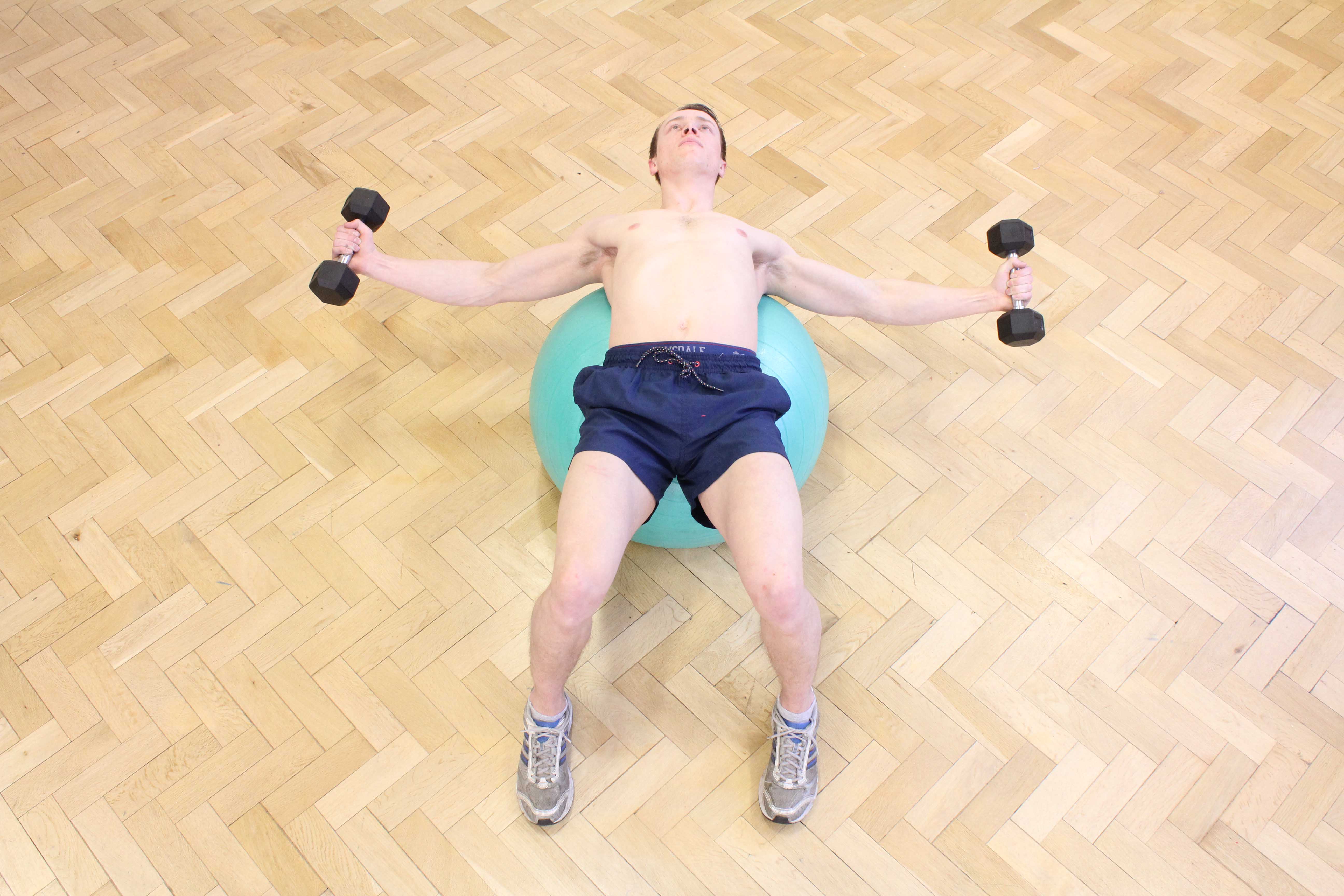 Progressive strength training for the chest muscles supervised by specialist MSK physiotherapist