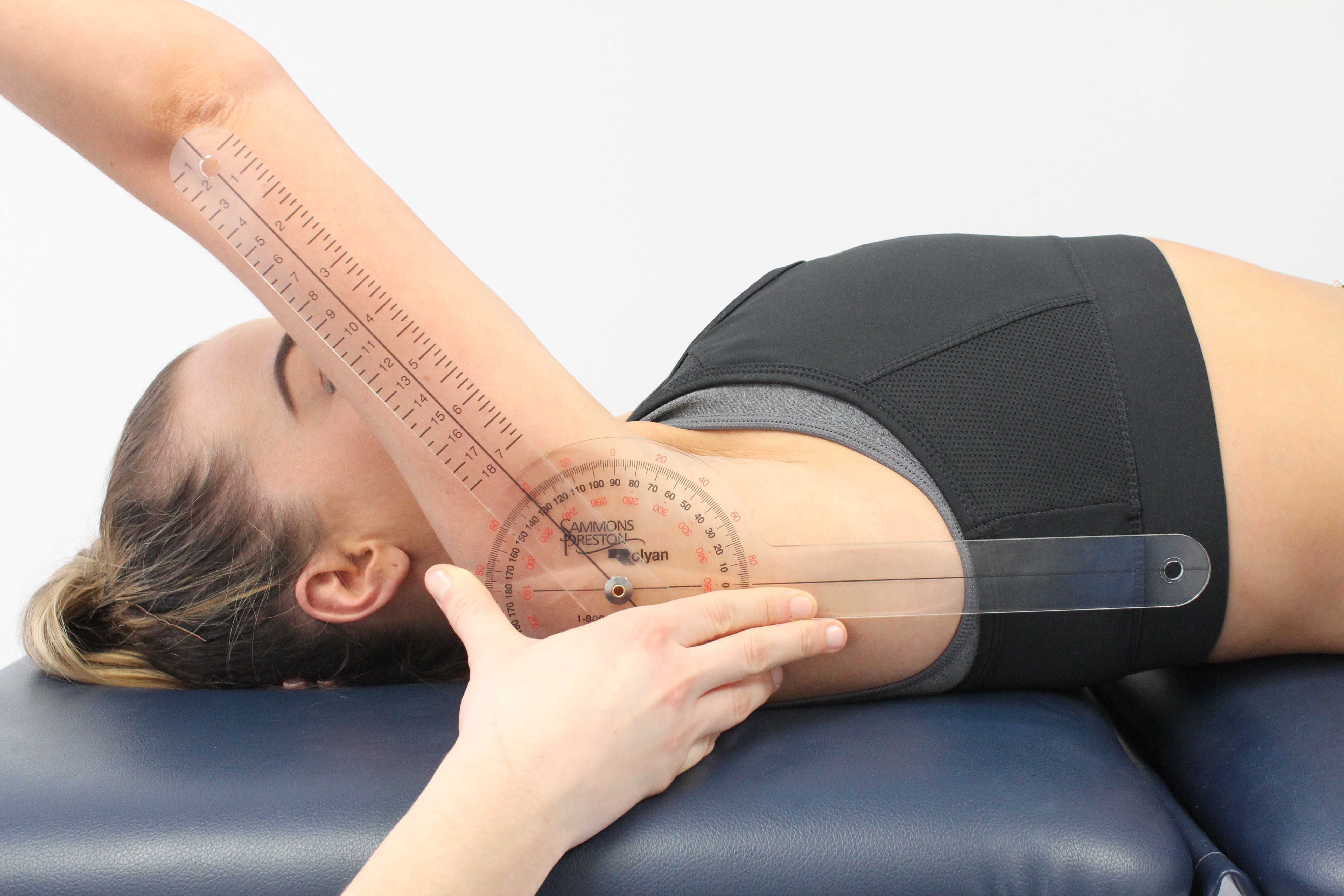 Shoulder assessment conducted by experienced therapist