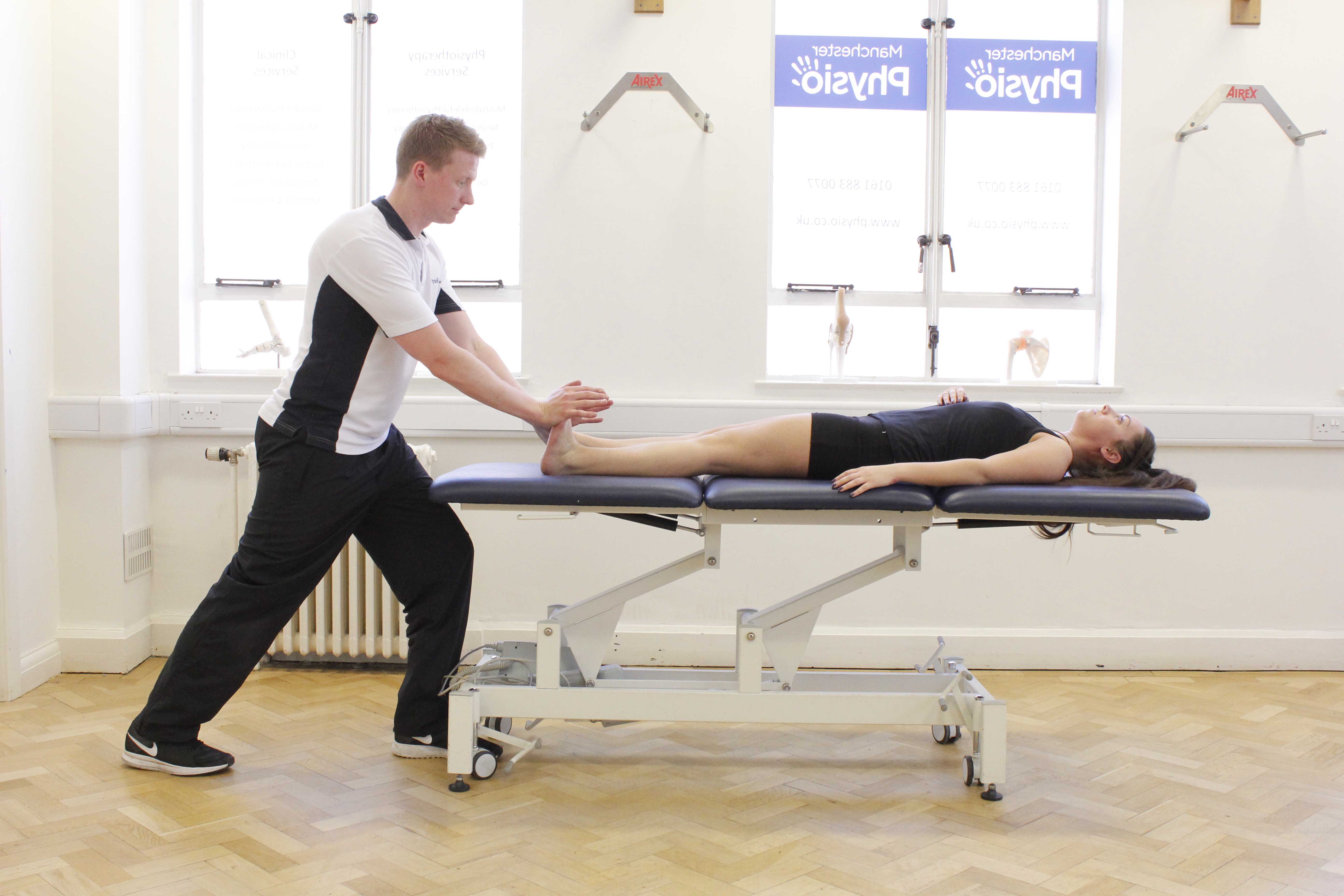 Passive stretch of the achilles tendon performed by specialist therapist