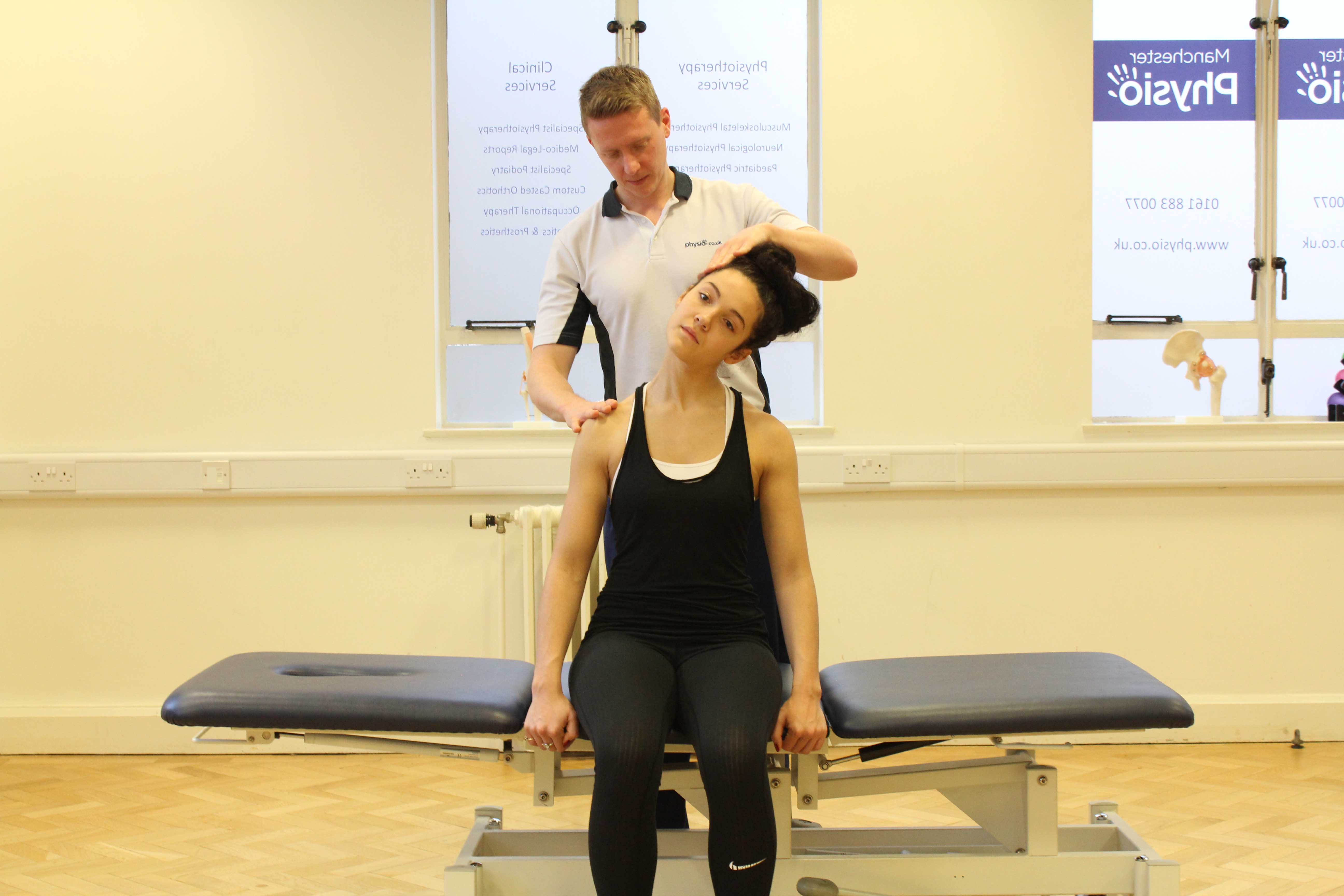 Assessment of the cervical spine, muscles and connective tissues in the neck performed by an experienced Physiotherapist Assessment of the cervical spine, muscles and connective tissues in the neck performed by an experienced Physiotherapist