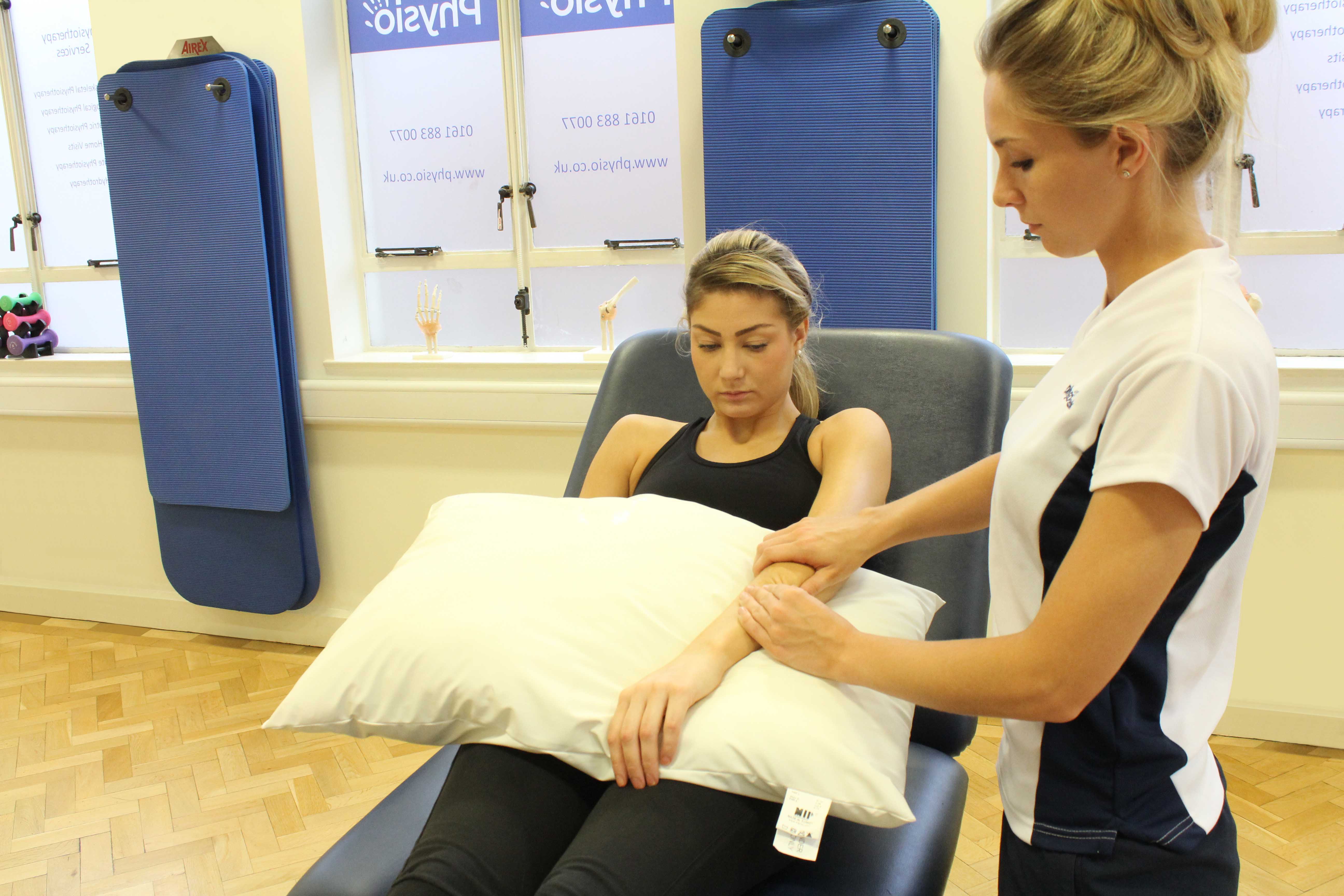 Soft tissue massage of the the connective tissues around the elbow