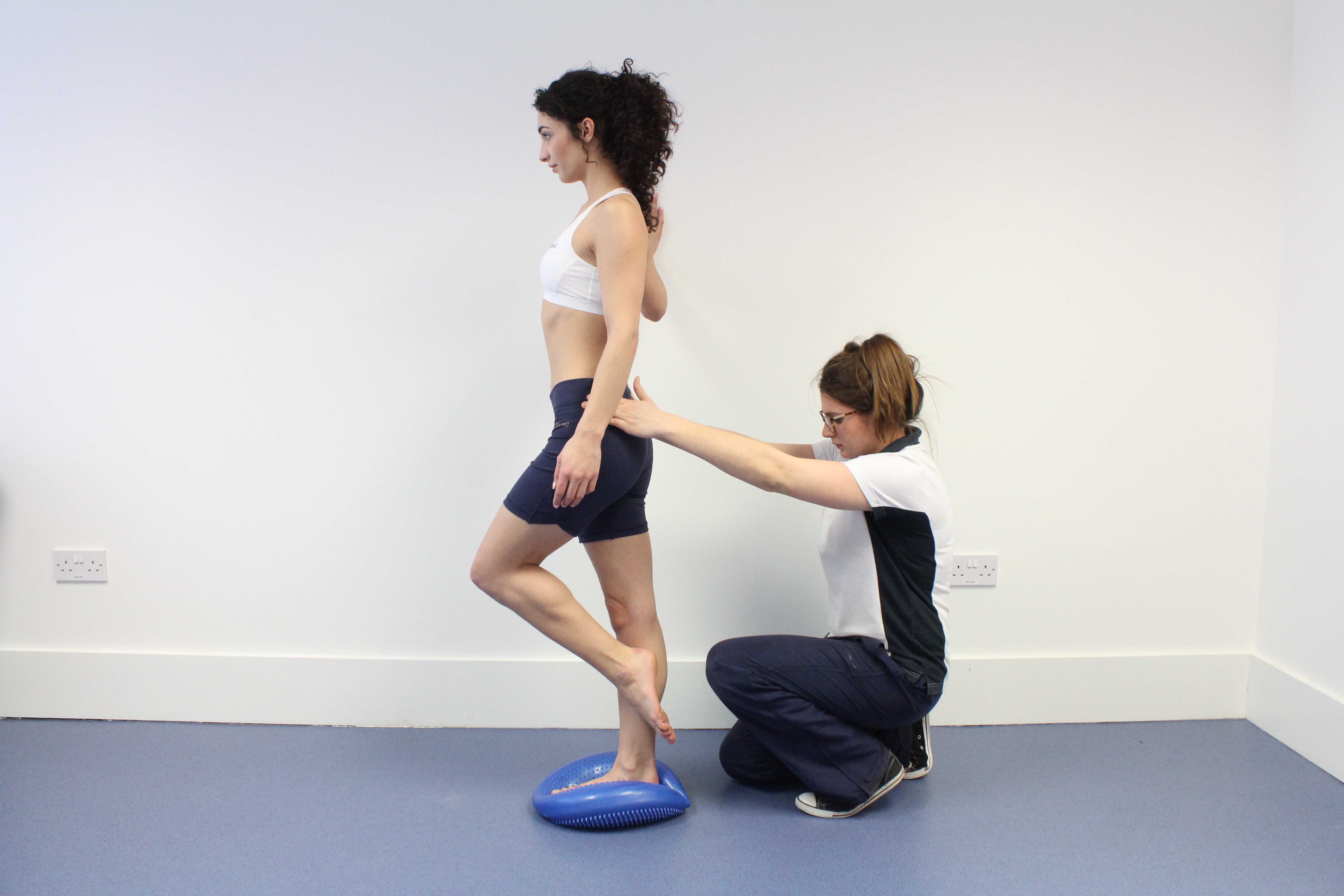 Balance and proprioception exercises assisted by a musculoskeletal physiotherapist