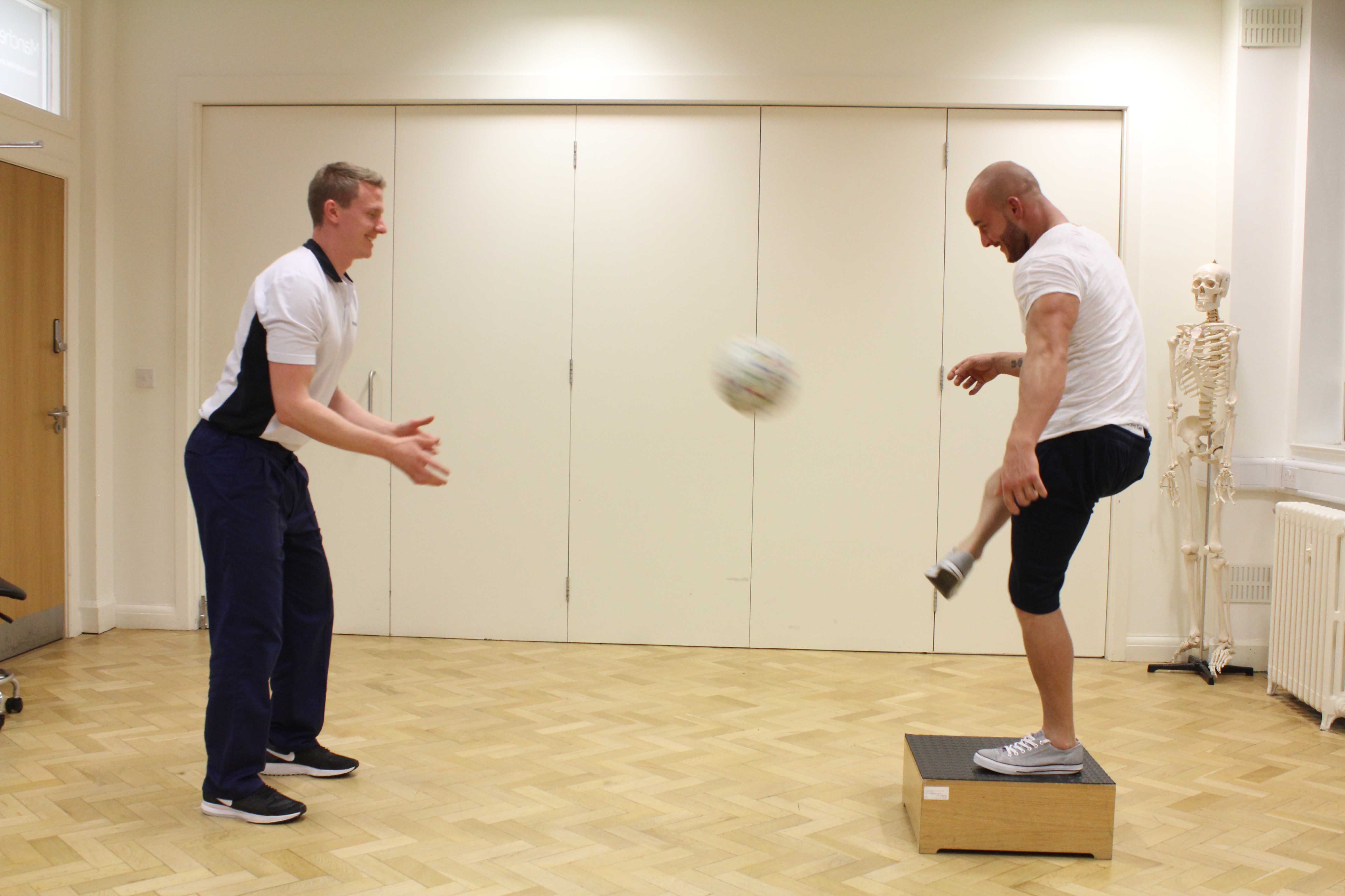 Dynamic balance and co-ordination exercises assisted by an experienced Physiotherapist