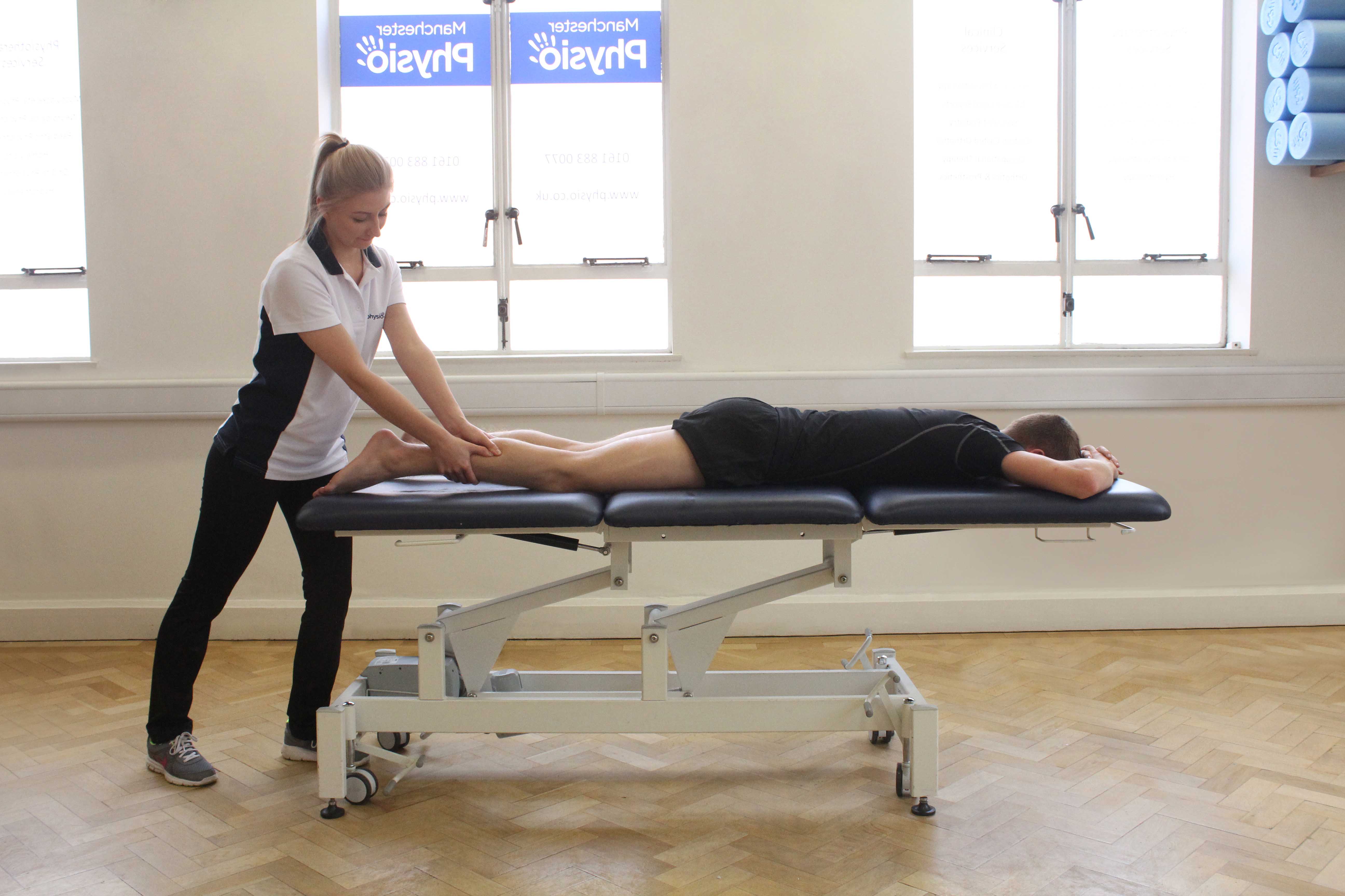 Trigger point massage applied to soleus muscle by specilaist therapist