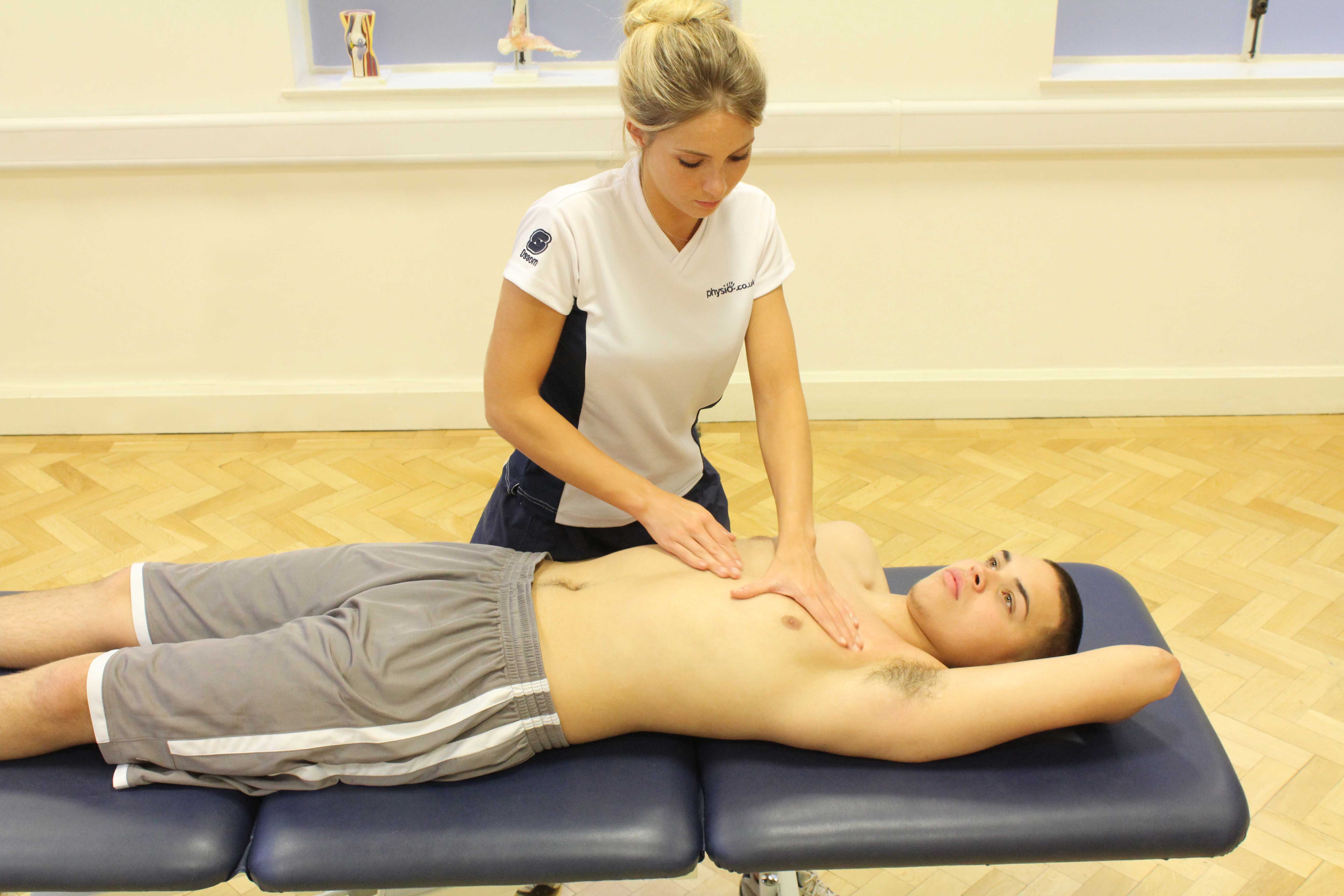 Soft tissue massage of the chest muscles by specialist therapist Soft tissue massage of the chest muscles by specialist therapist