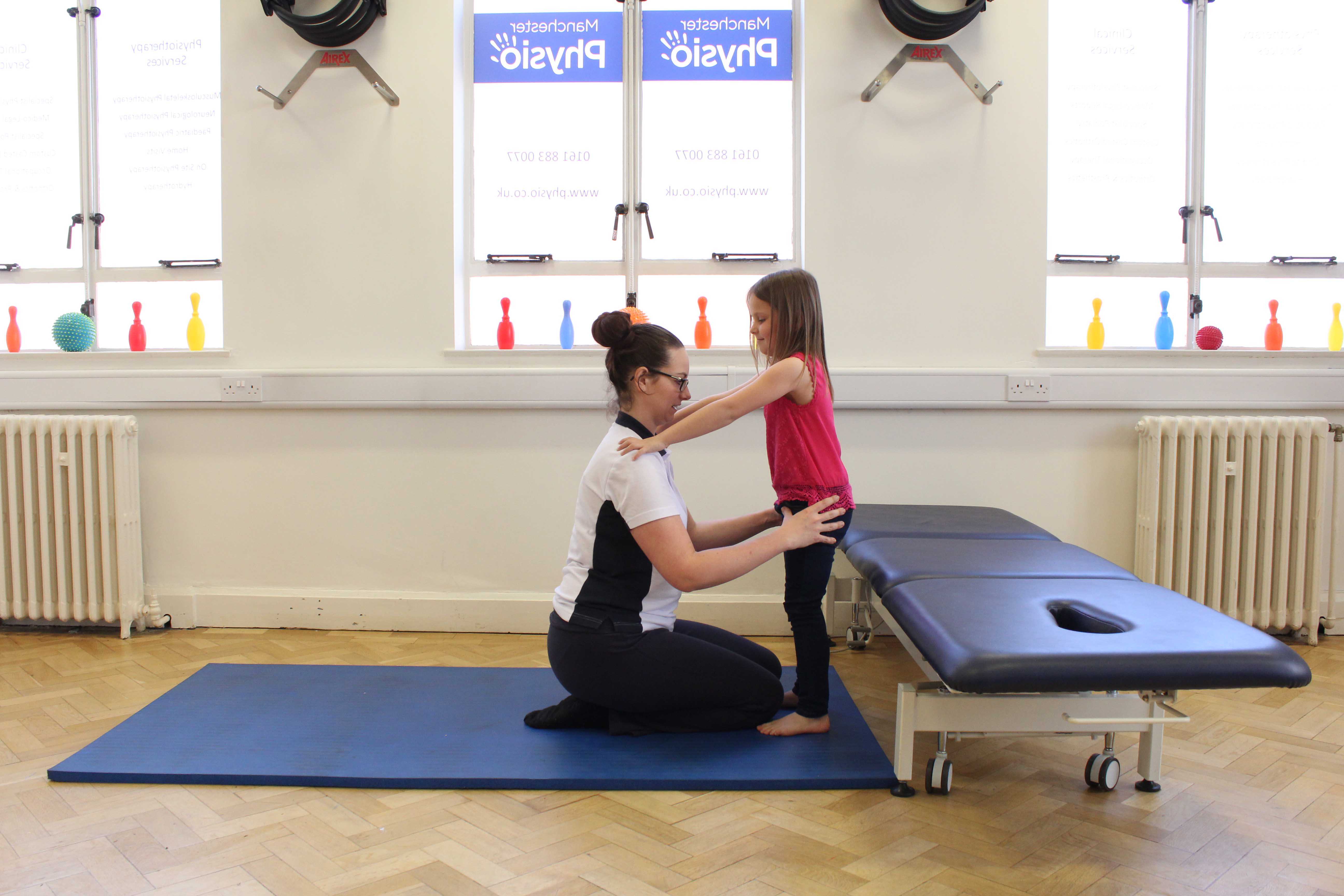 strength and stretching rehabilitation exercises guided by paediatric physiotherapist