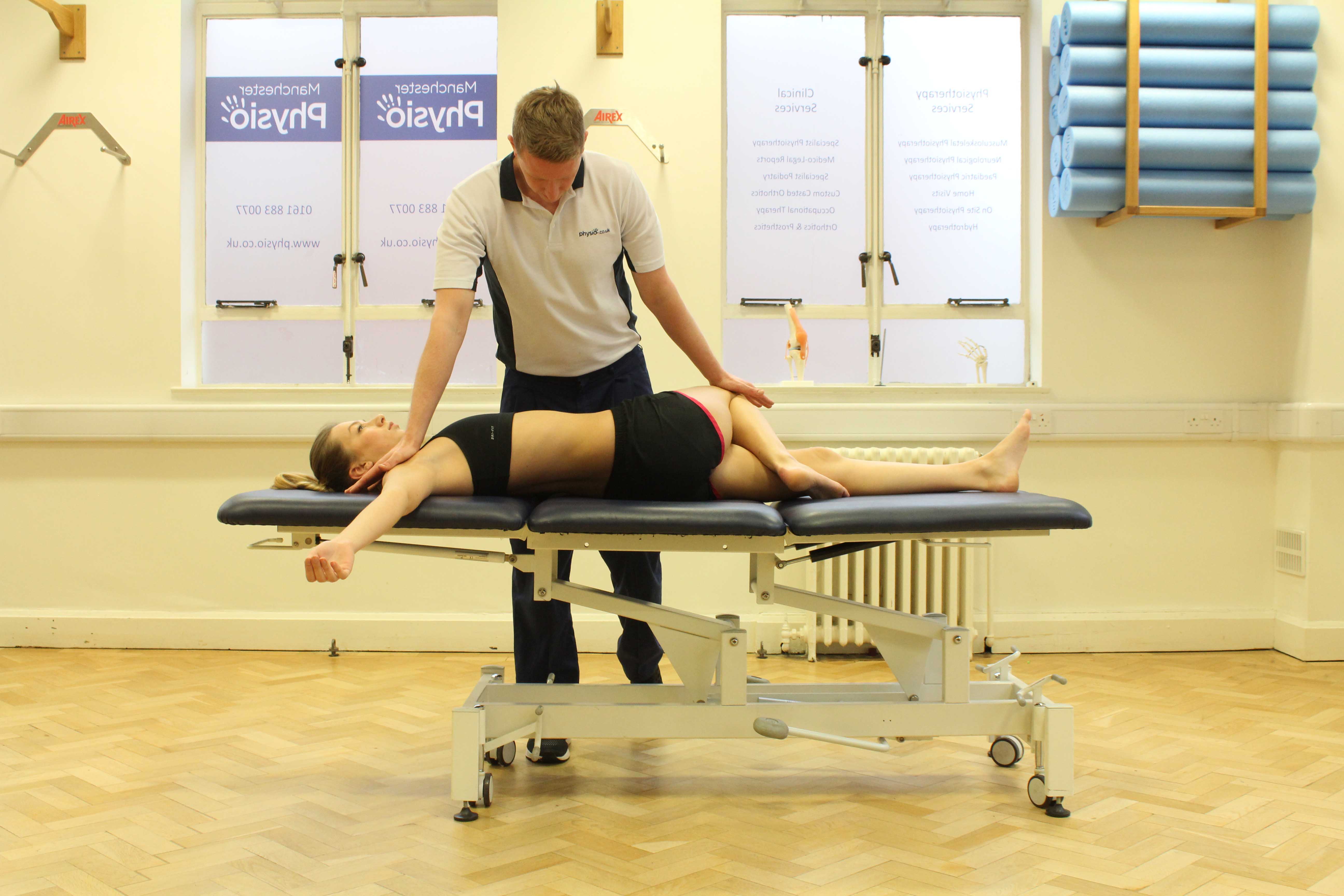 Passive stretches of the lower back muscles and connective tissues