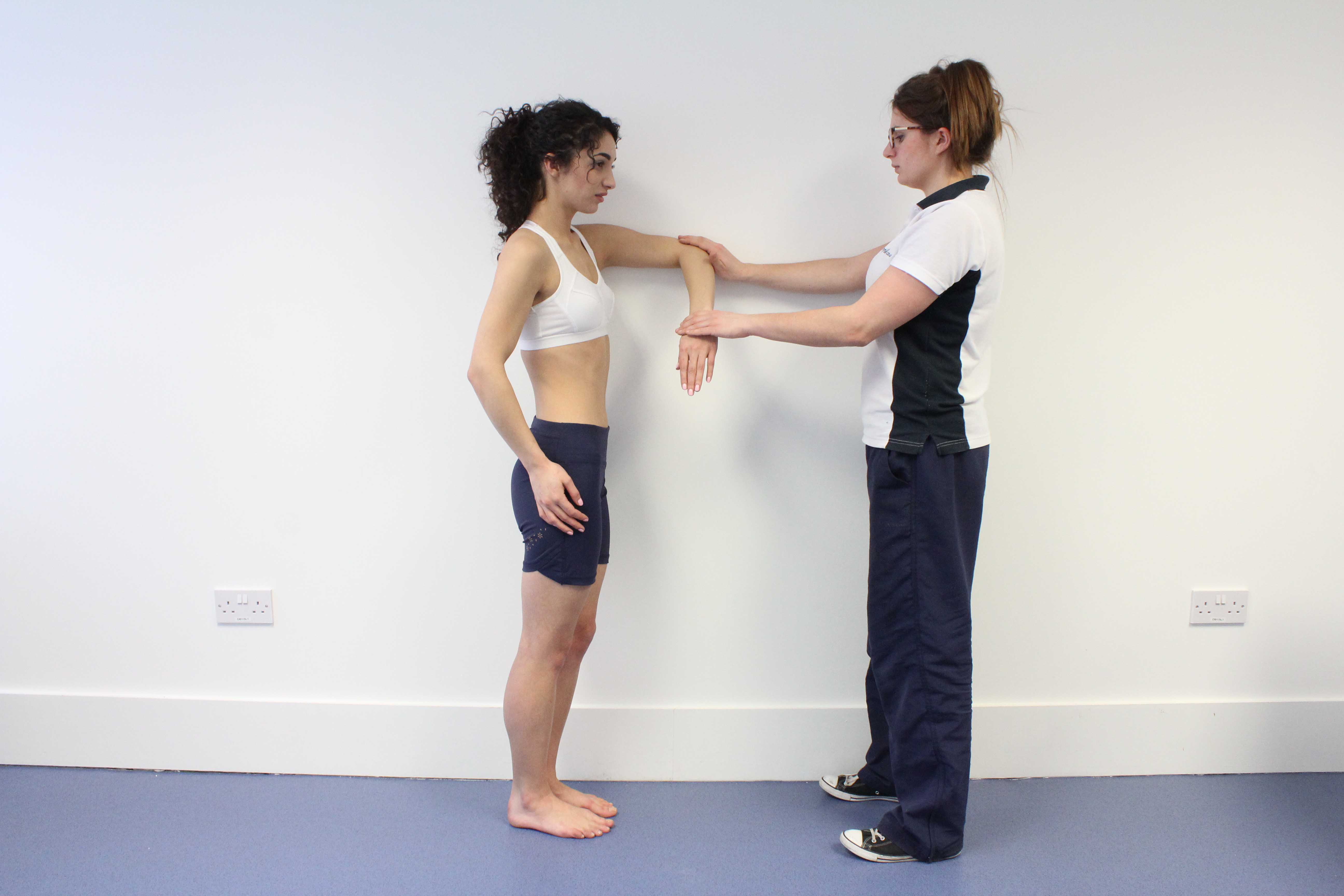 Passive stretches and mobilisations of the elbow by MSK therapist