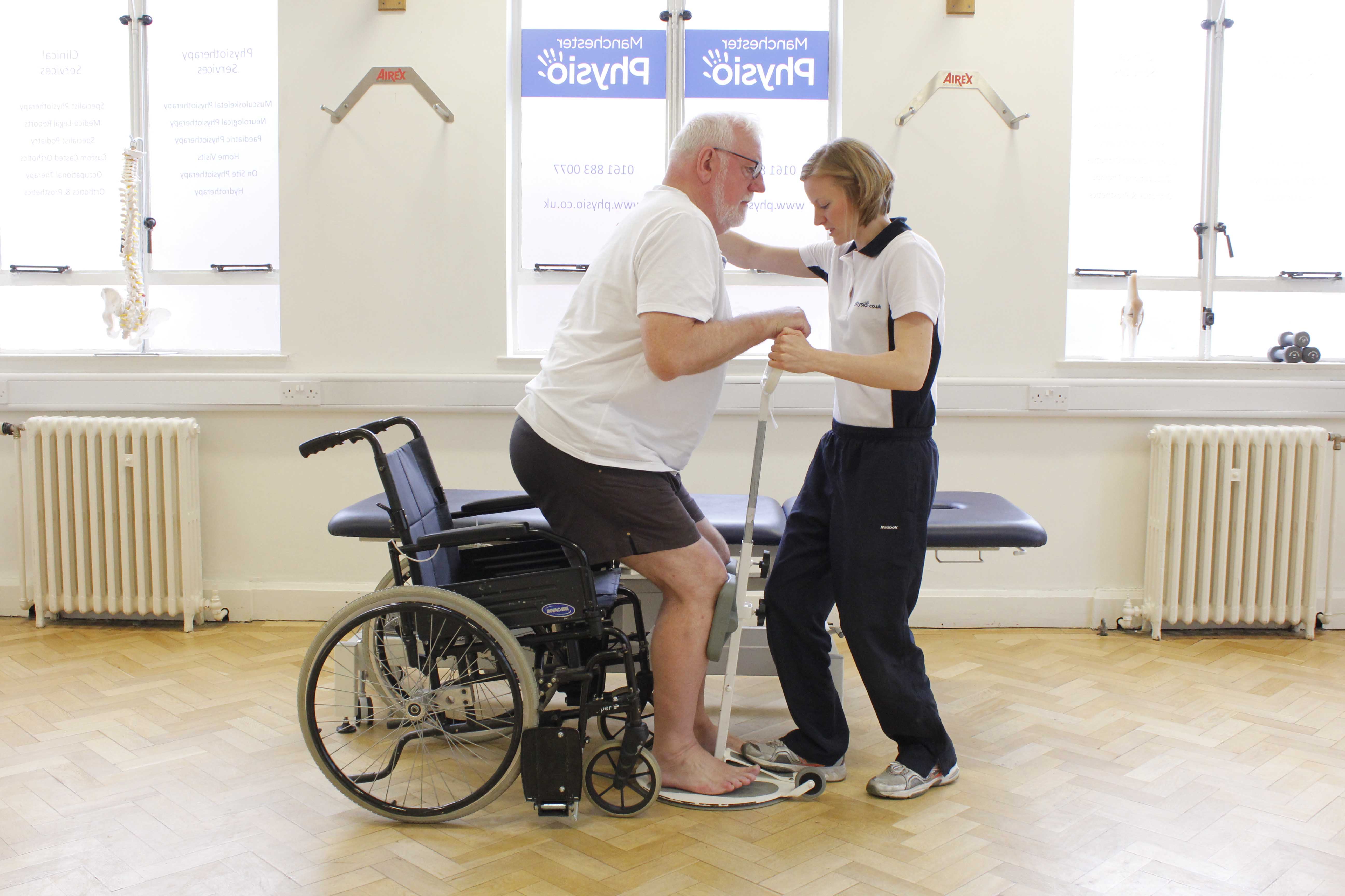 Practice of transfers with assistance of specialist physiotherapist Practice of transfers with assistance of specialist physiotherapist