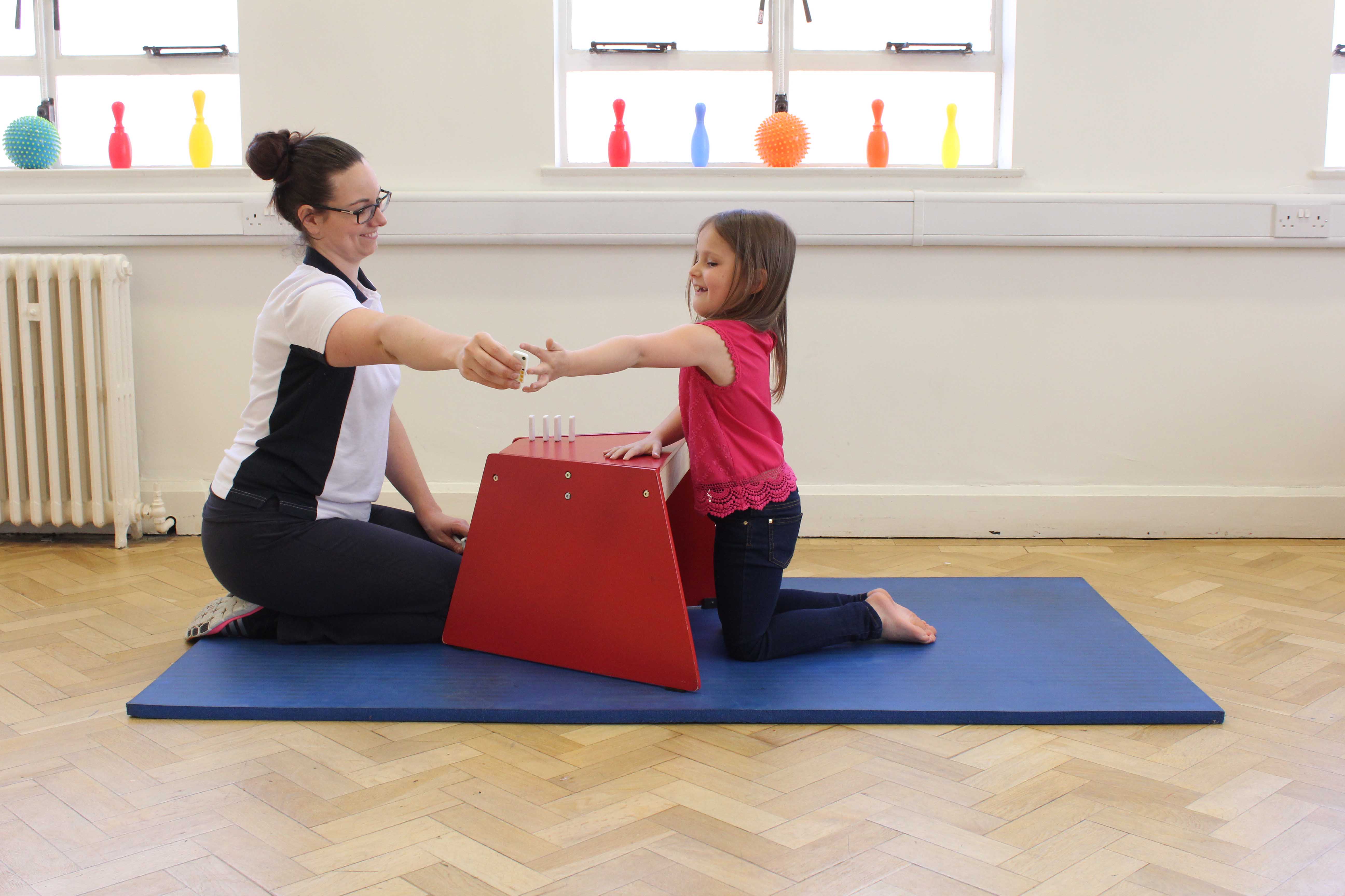 Testing fine motor control with therapist led exercises