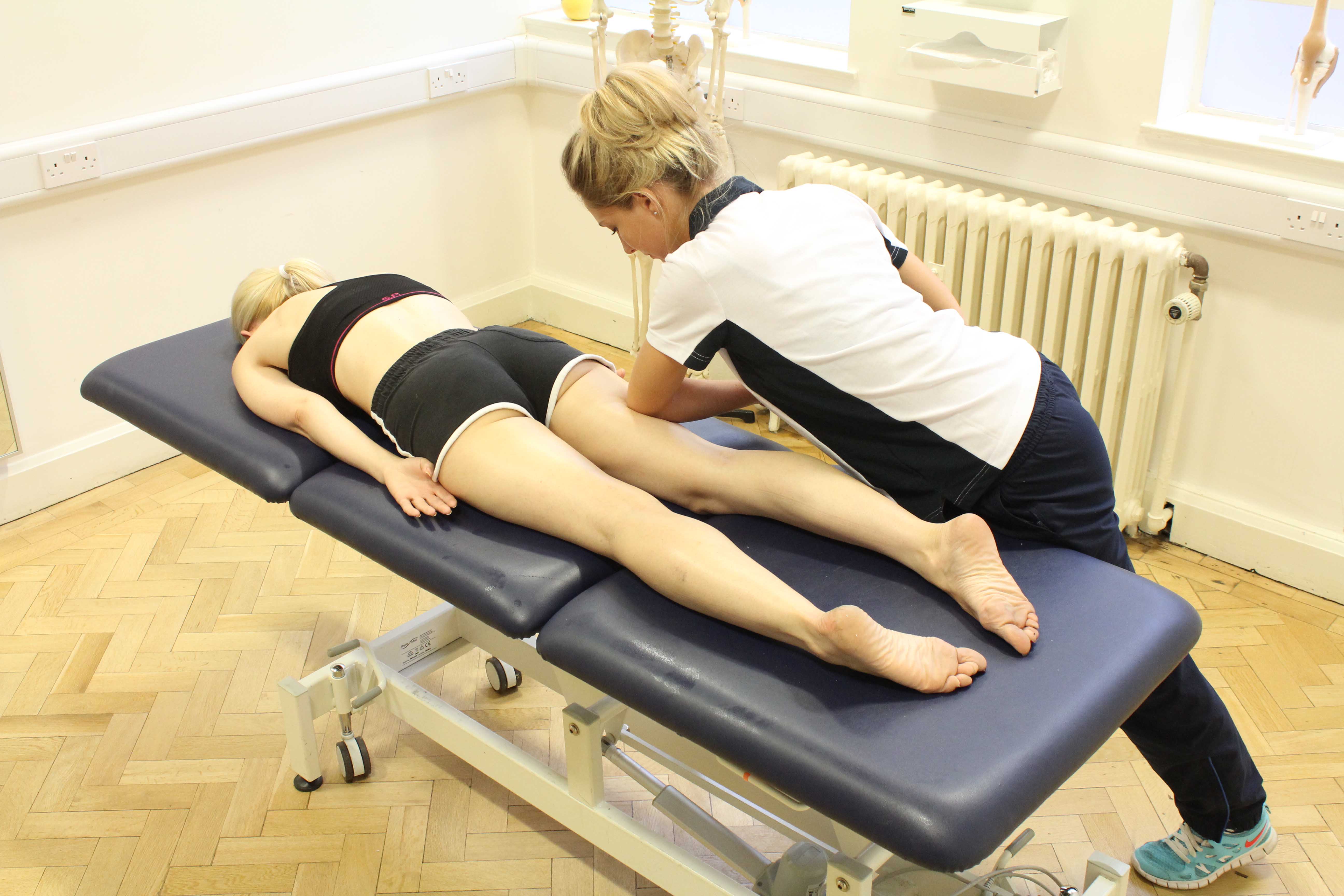 Deep tissue massage of the hamstring muscles by specialist MSK therapist