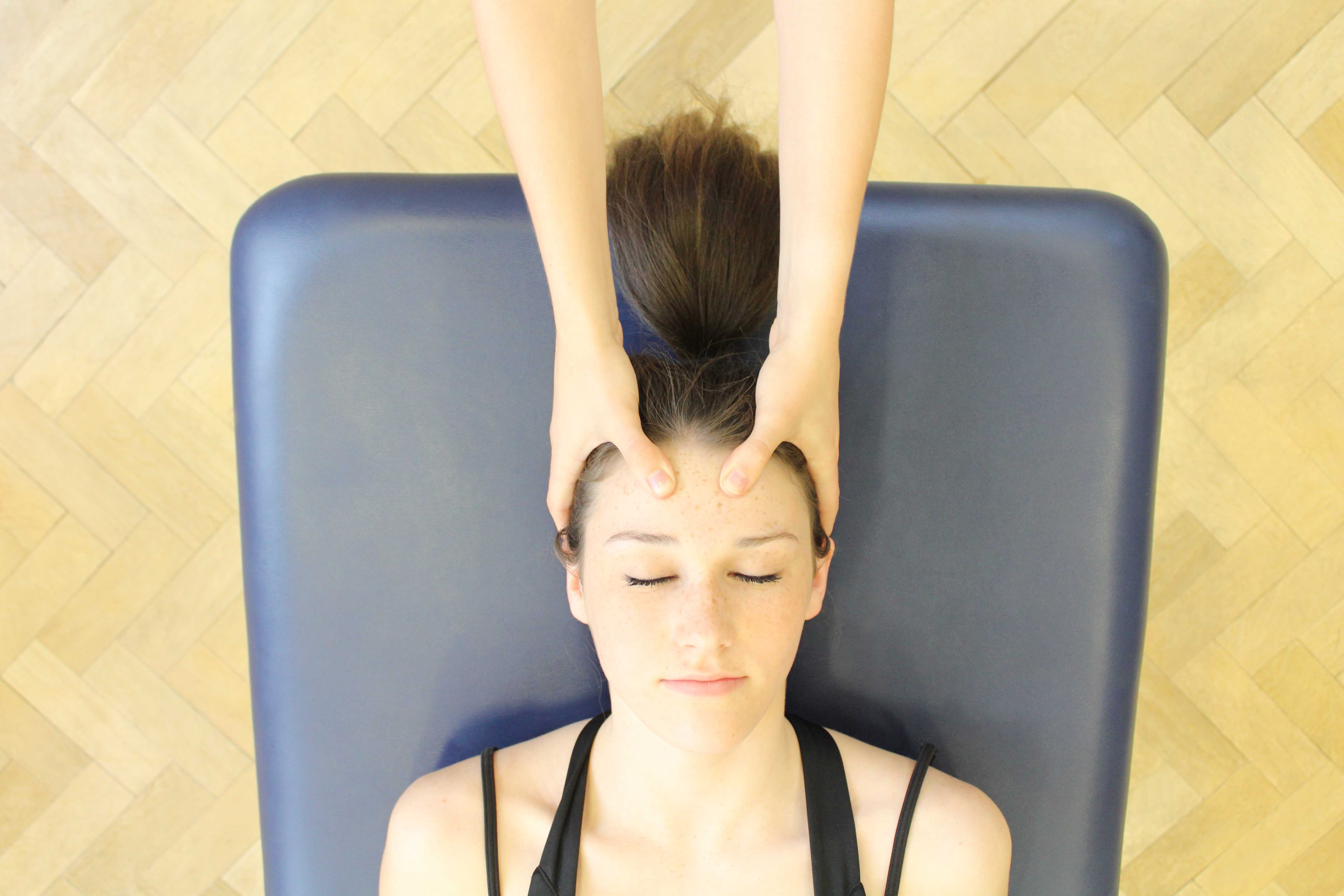 Accupressure massage of the head and face by specialist therapist Accupressure massage of the head and face by specialist therapist
