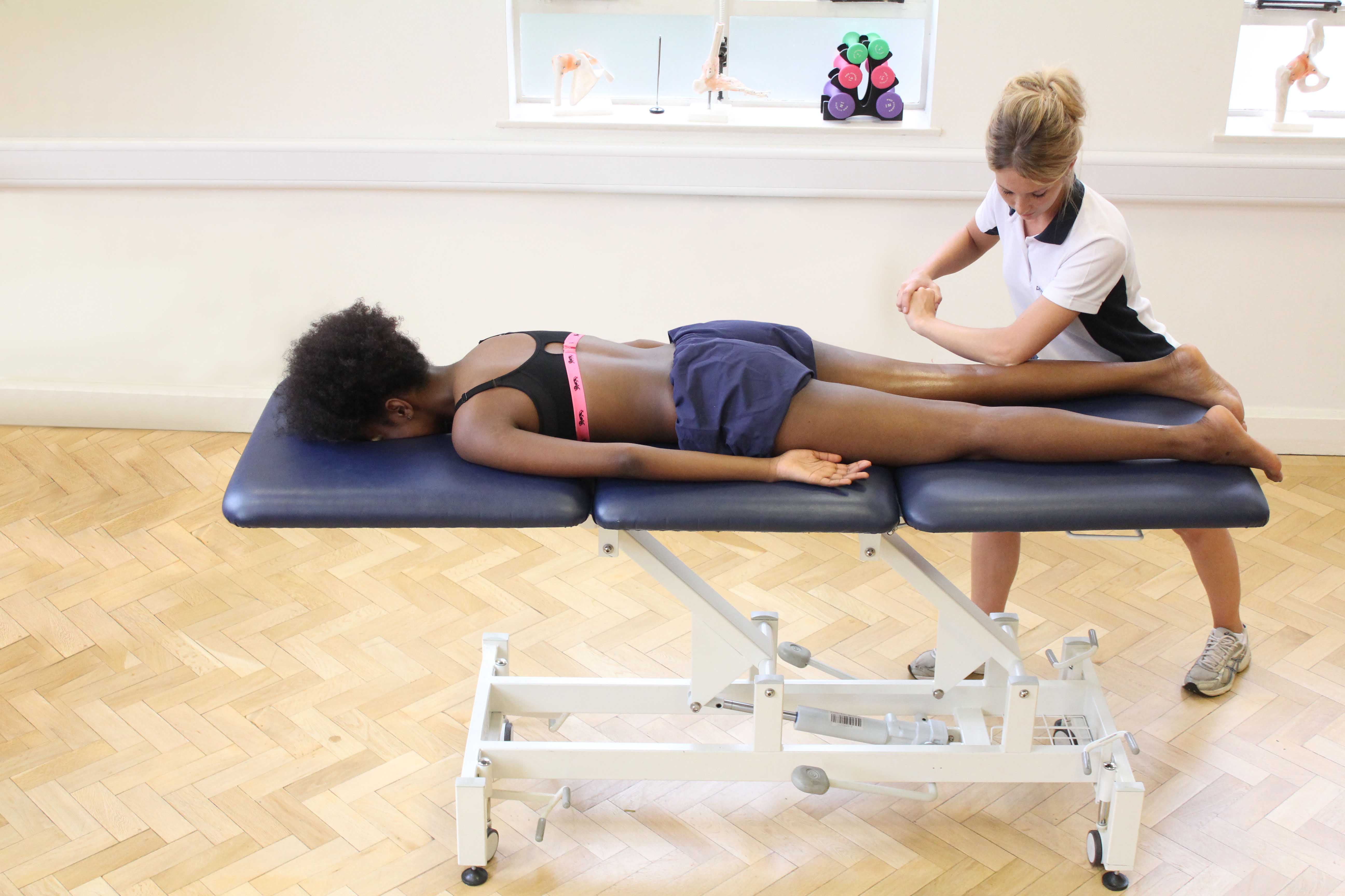 Deep tissue massage used to lower tone in muscle applied by an experienced therapist