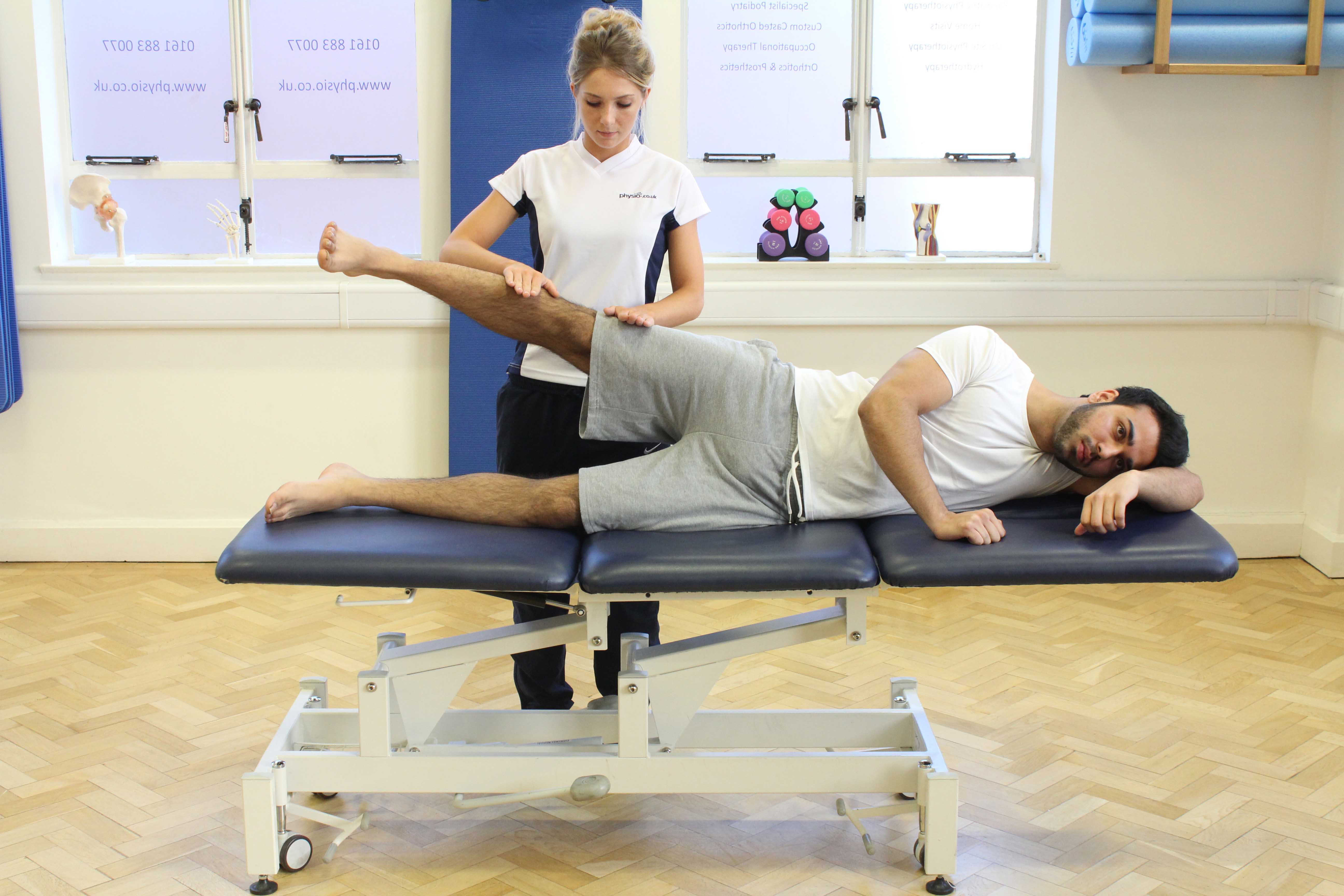 Progressive strengthening hip exercises supervised by experienced therapist