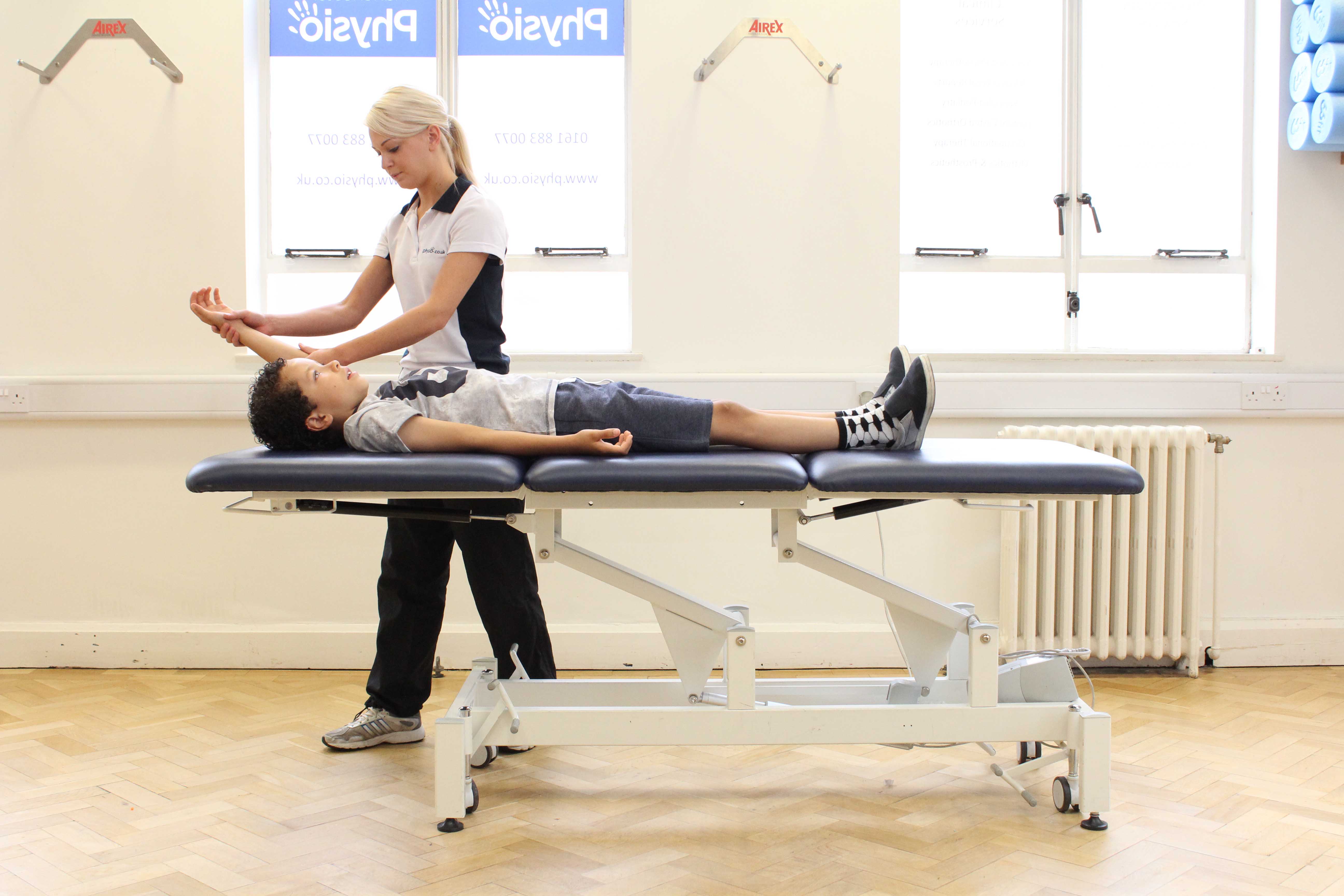 Balance and co-ordination exercises supervised by a paediatric physiotherapist