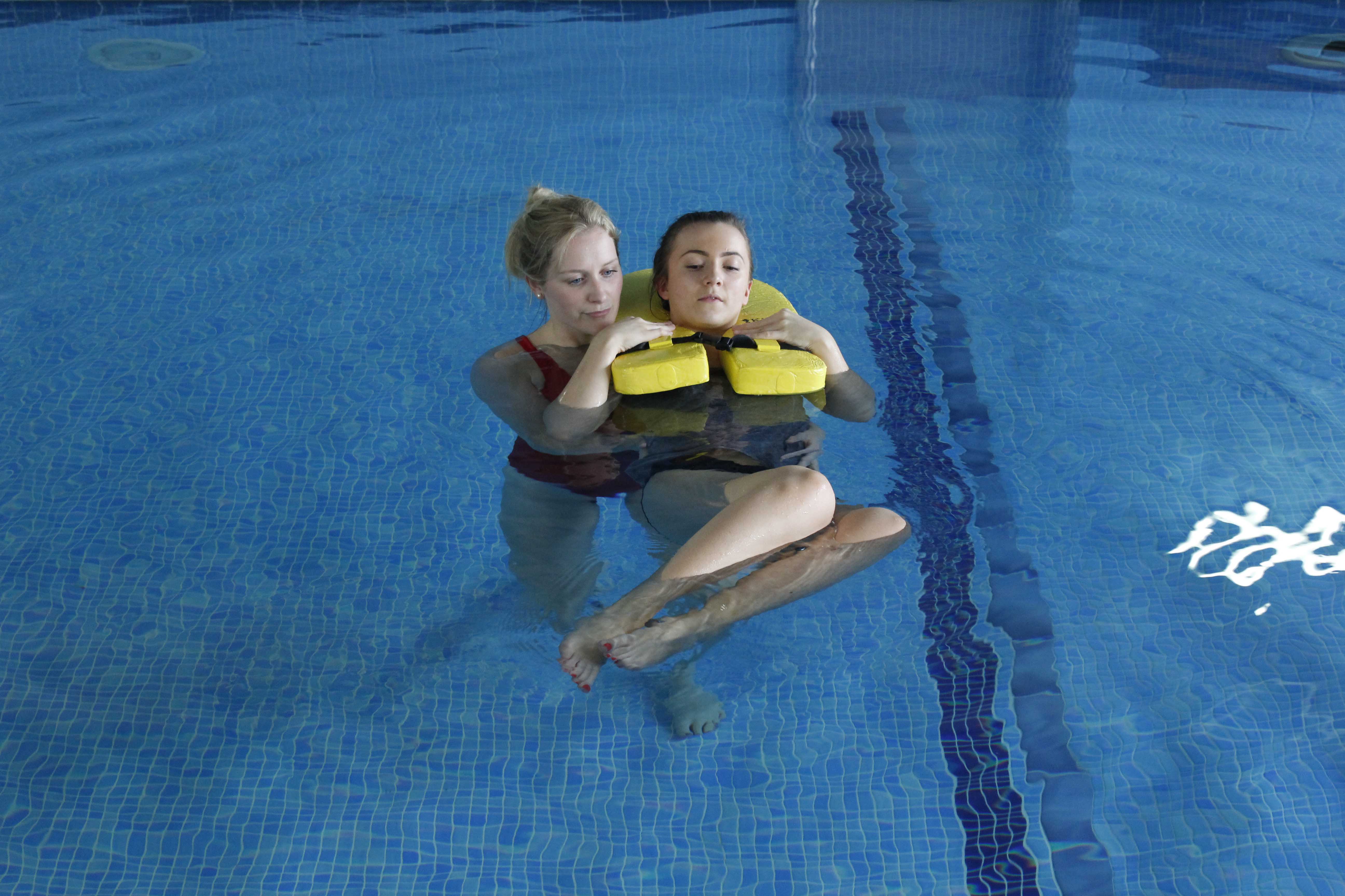 Hydrotherapy session with close supervision from specialist physiotherapist