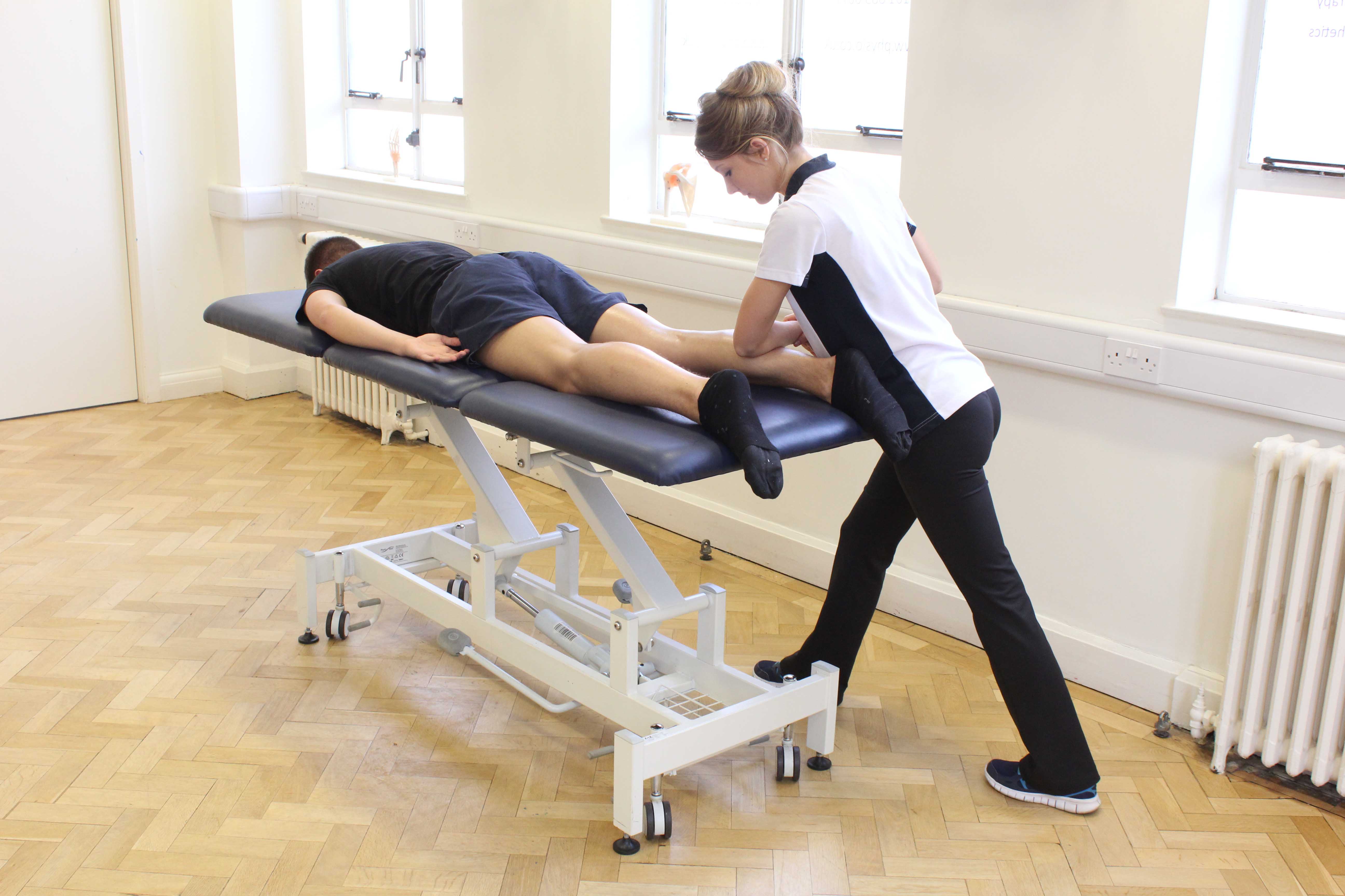Deep tissue massage of the gastroc nemius to improve circulation 