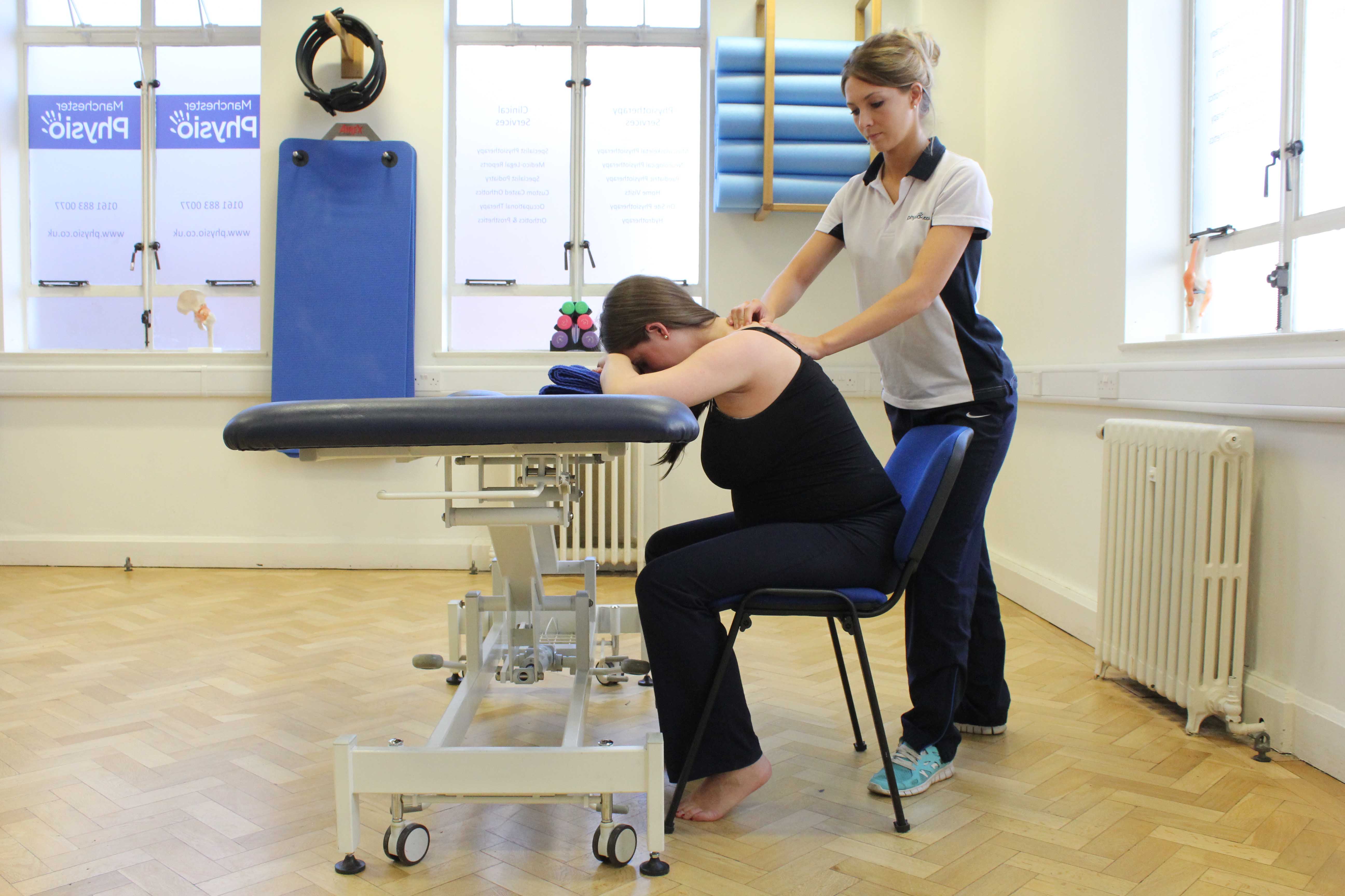 Neck and shoulder soft tissue massage from experienced therapist to reduce tension and aching