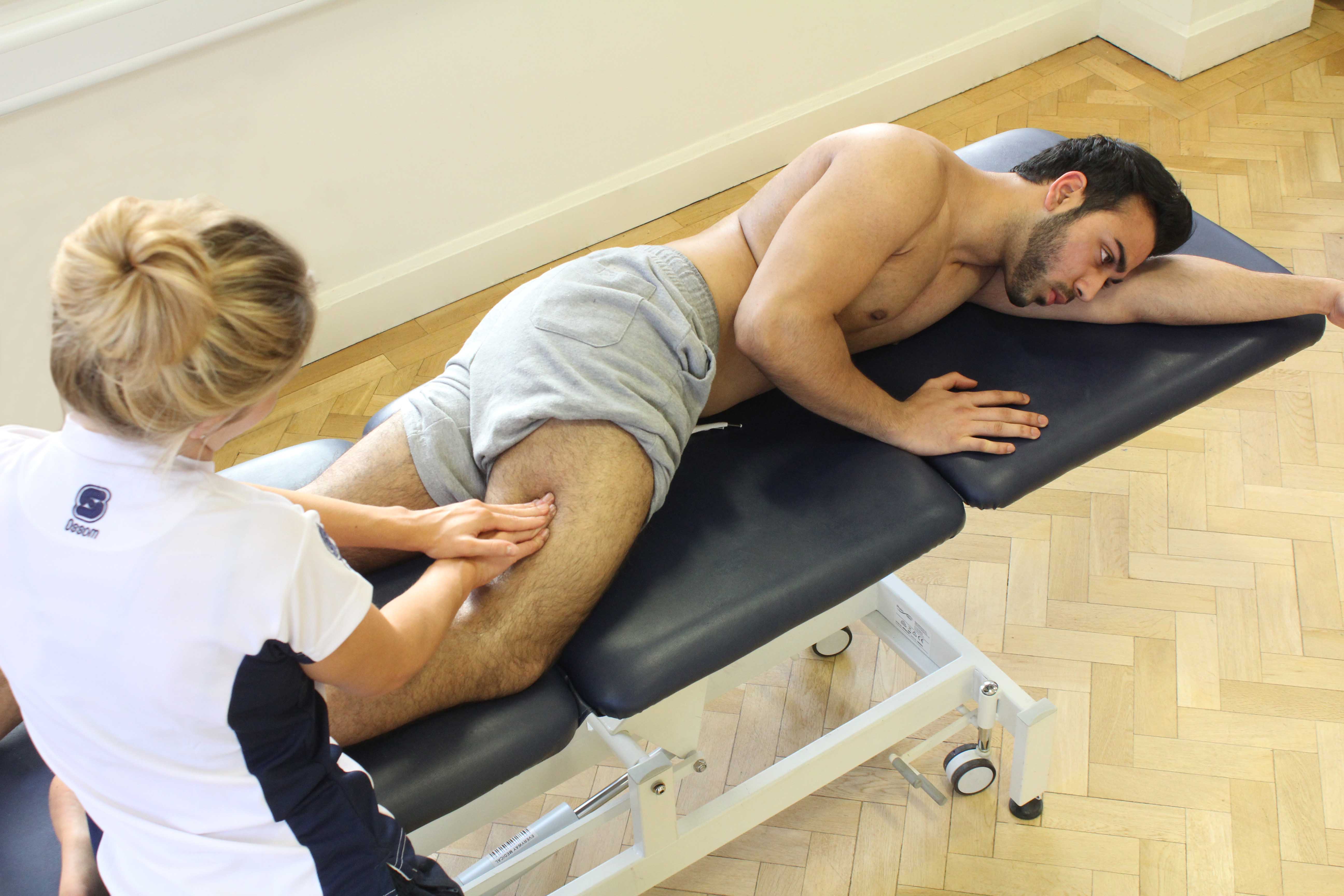 Soft tissue massage of vastus lateralis and illio-tibial band Soft tissue massage of vastus lateralis and illio-tibial band