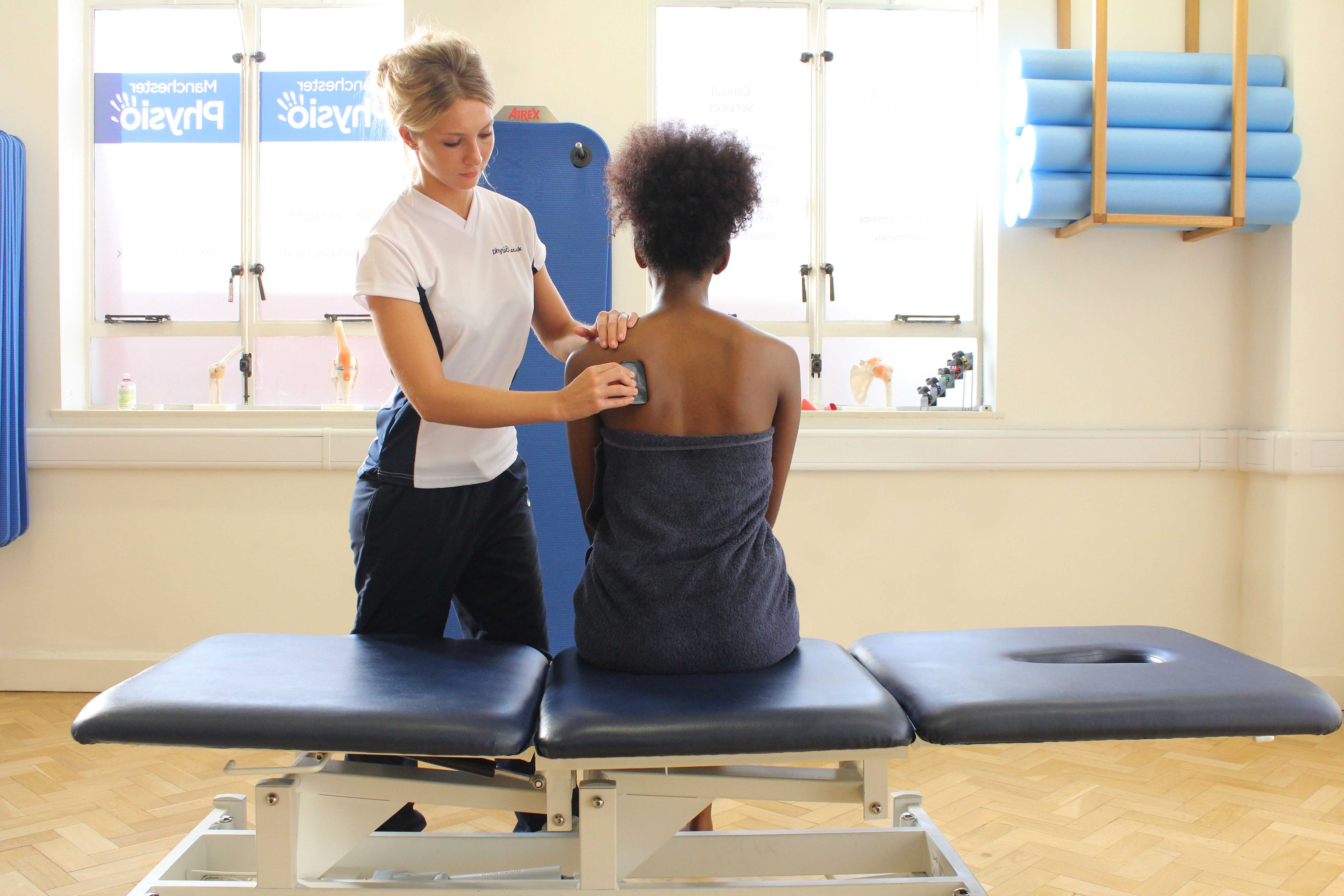 Use of a therapy aid for a stripping massage technique by a specialist massage therapist
