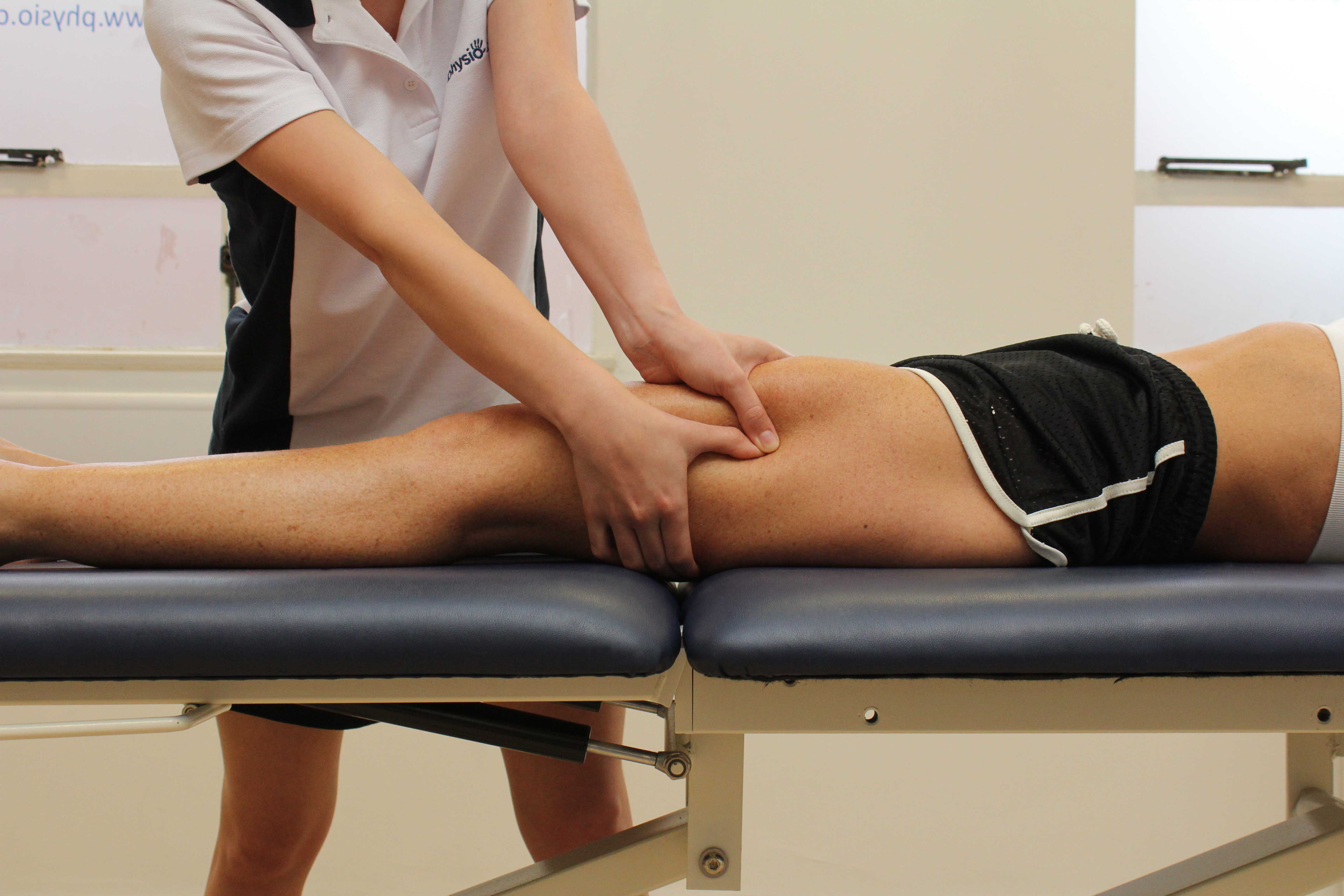 Trigger point massage applied to the illiotibial band