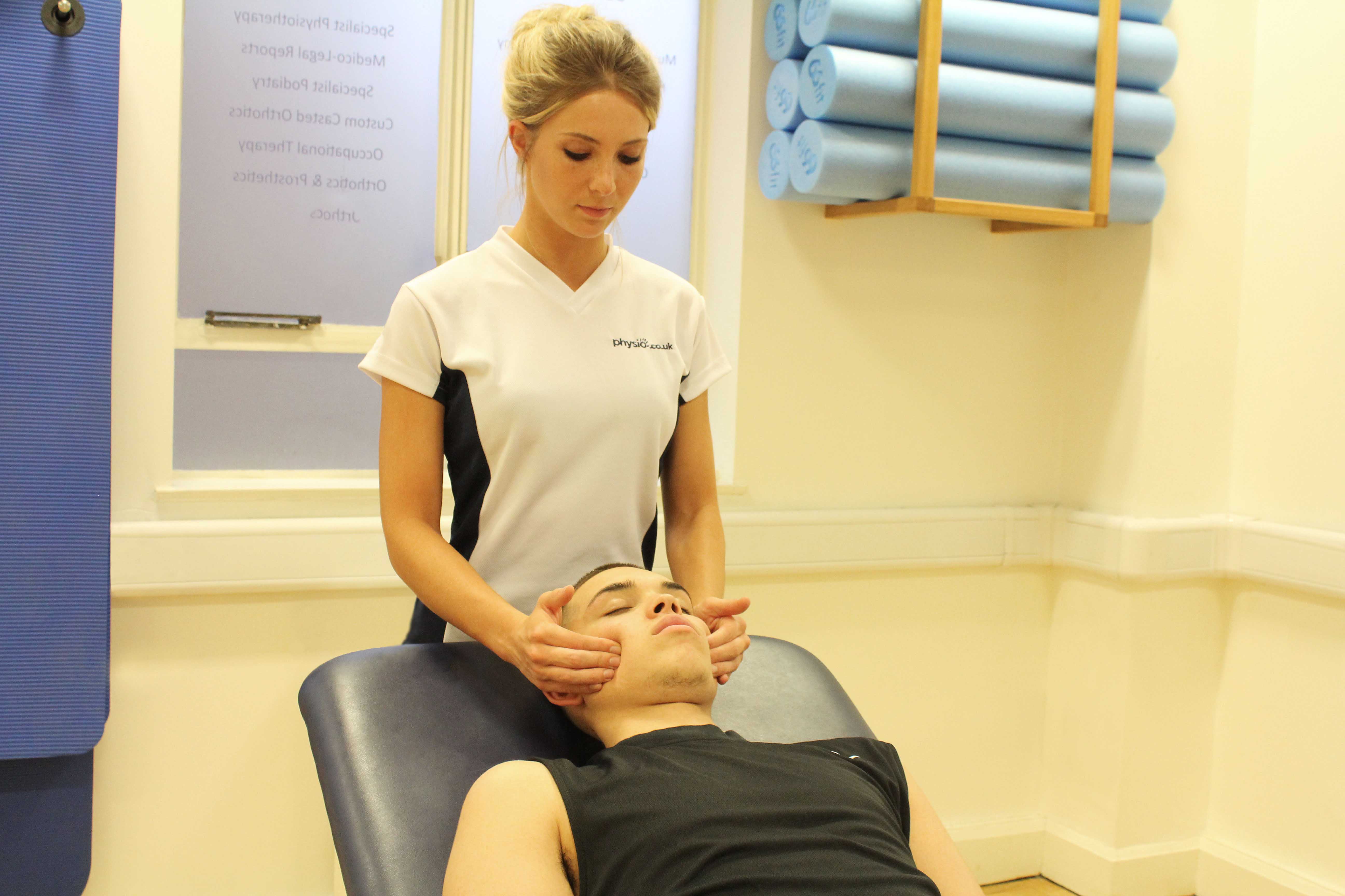 Soft tissue massage and mobilisation of the jaw to relieve stiffness and pain