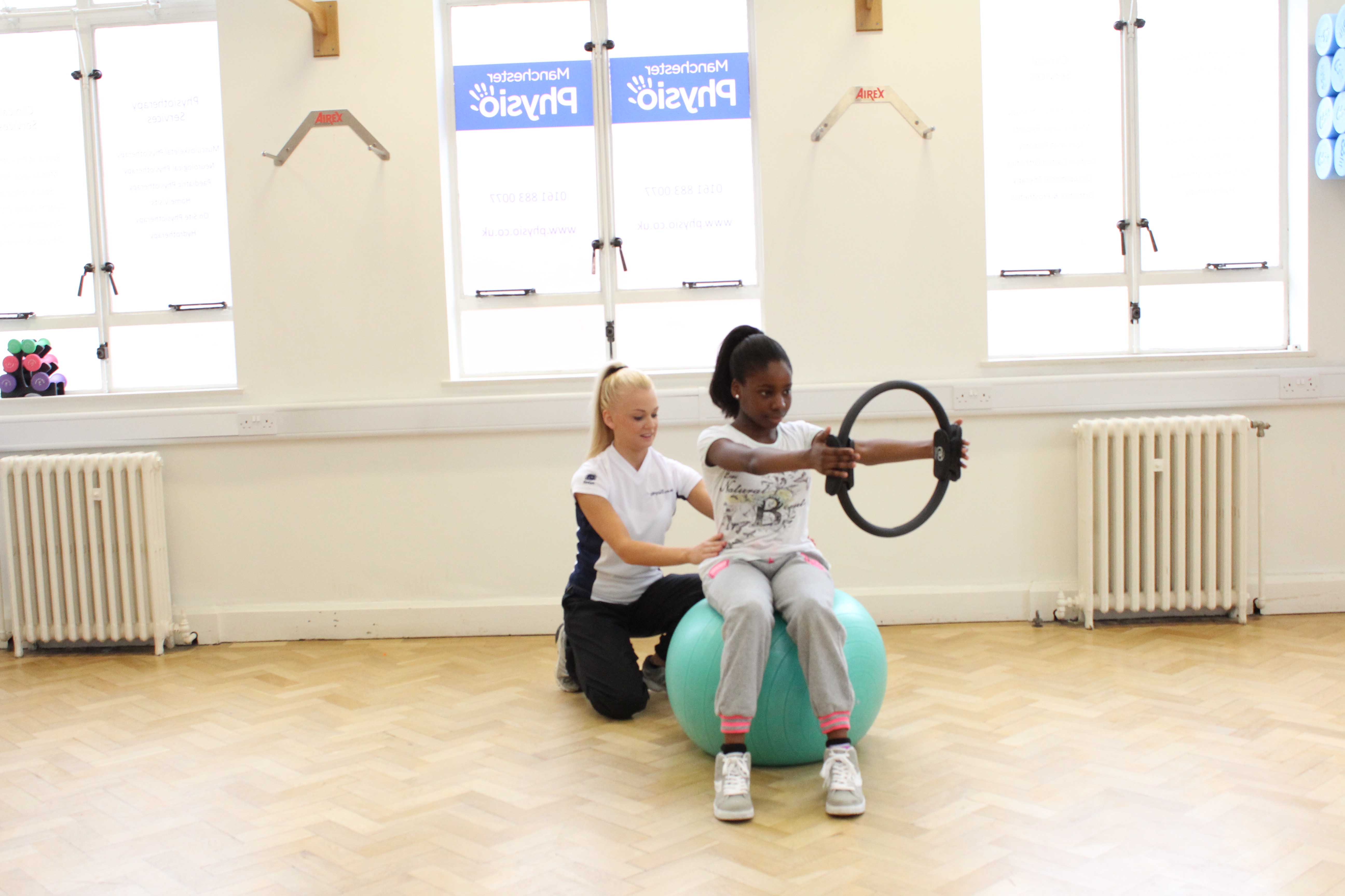 Core stability and stretching exercises supervised by a paediatric physiotherapist