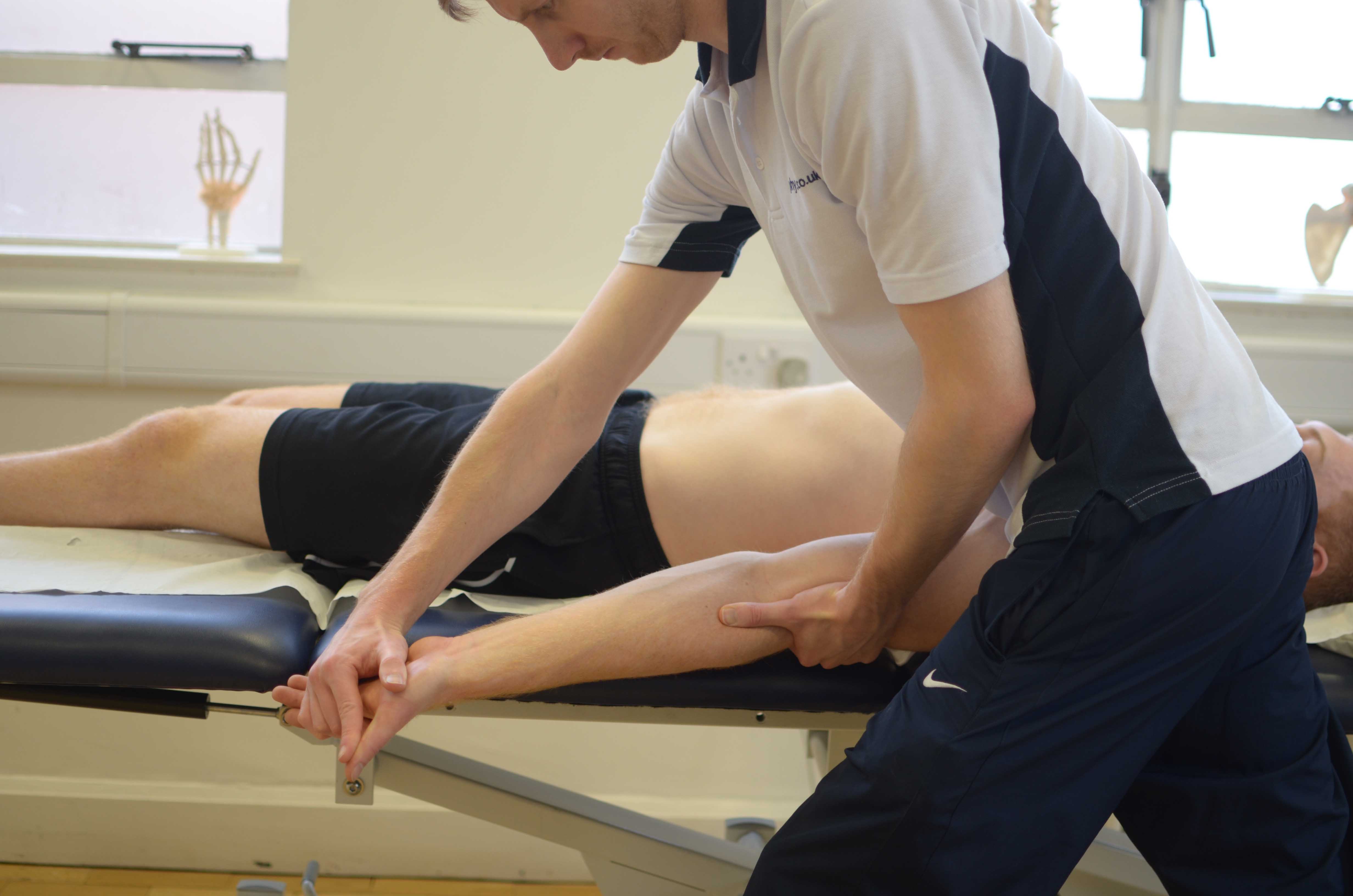 Passive stretches and mobilisations of the elbow by MSK therapist