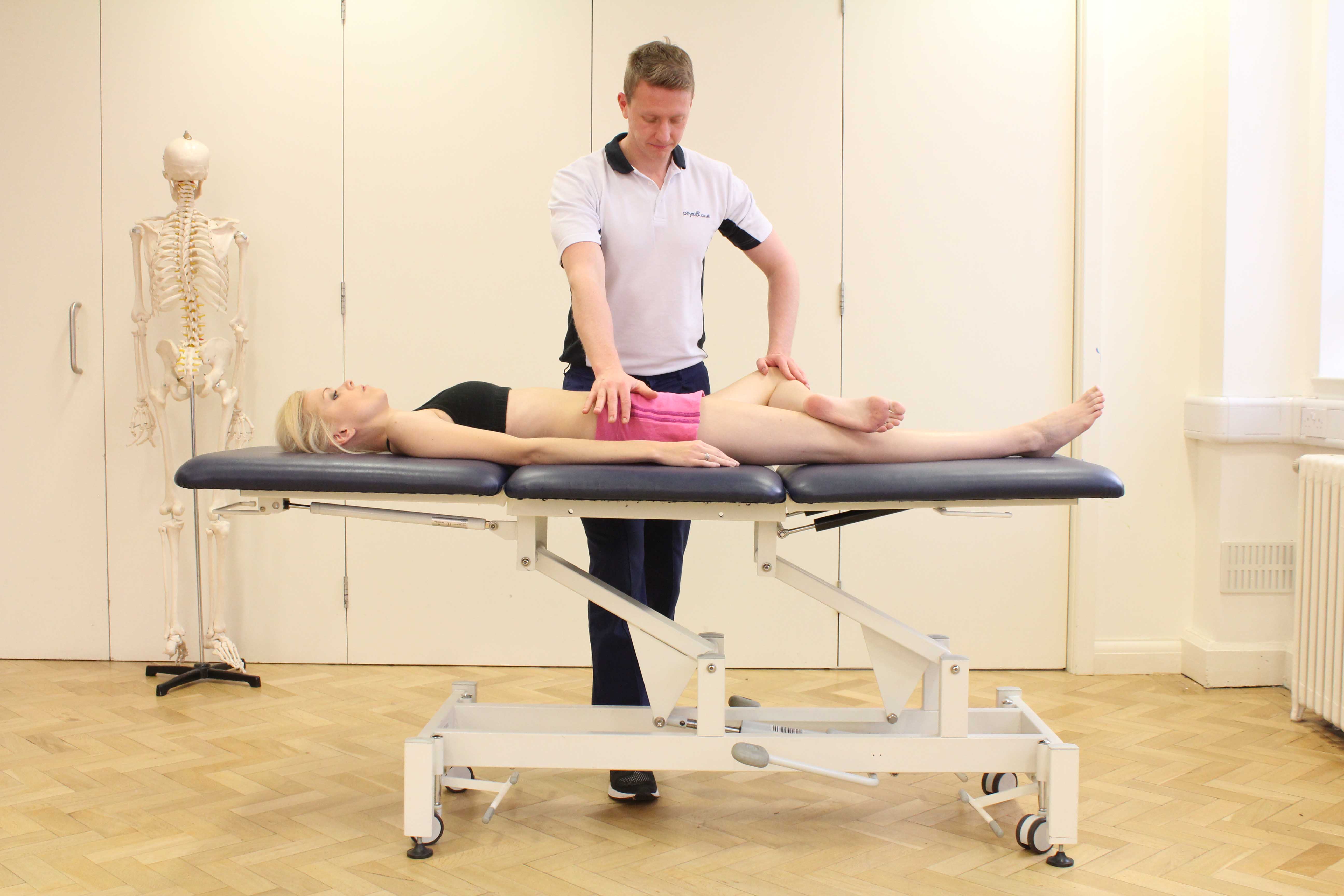 Passive stretches of the hip and pelvis performed by a senior musculoskeletal physiotherapsit
