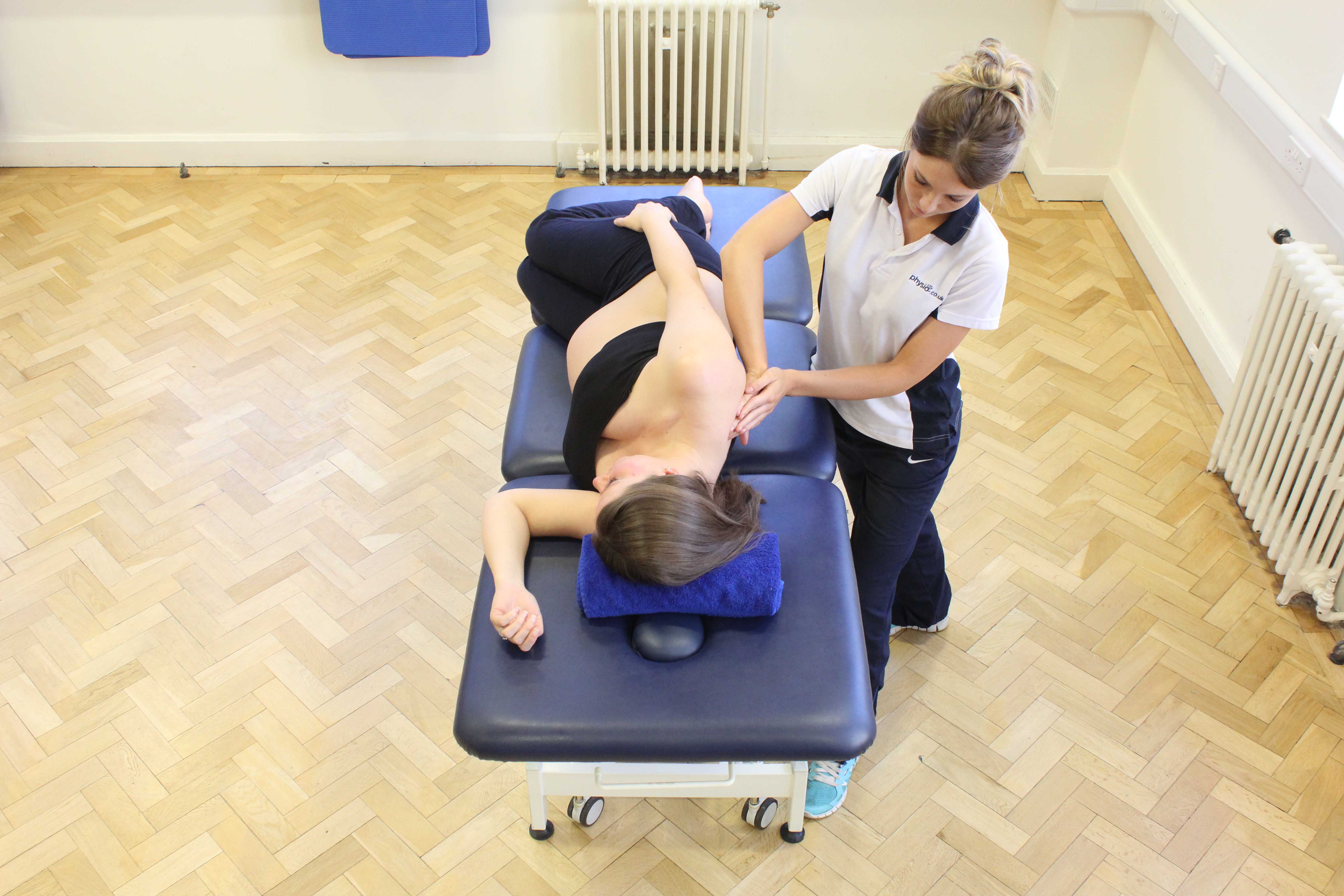 Upper back and shoulder massage during pregnancy