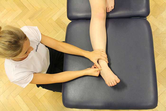 Customer receiving foot massage in Manchester Physio Clinic