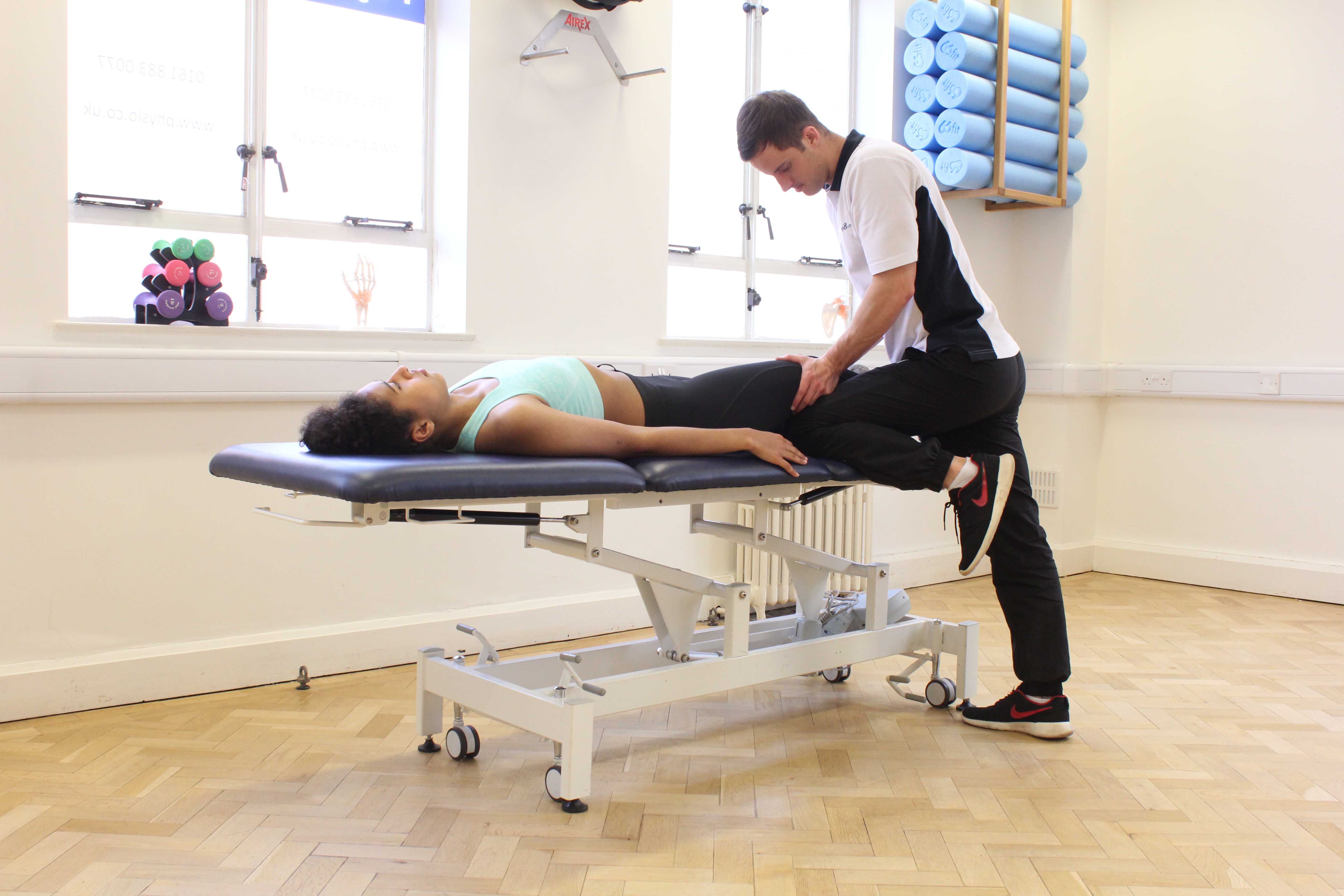 Mobilisations of the lumbar vertebrea by a specilaist physiotherapist