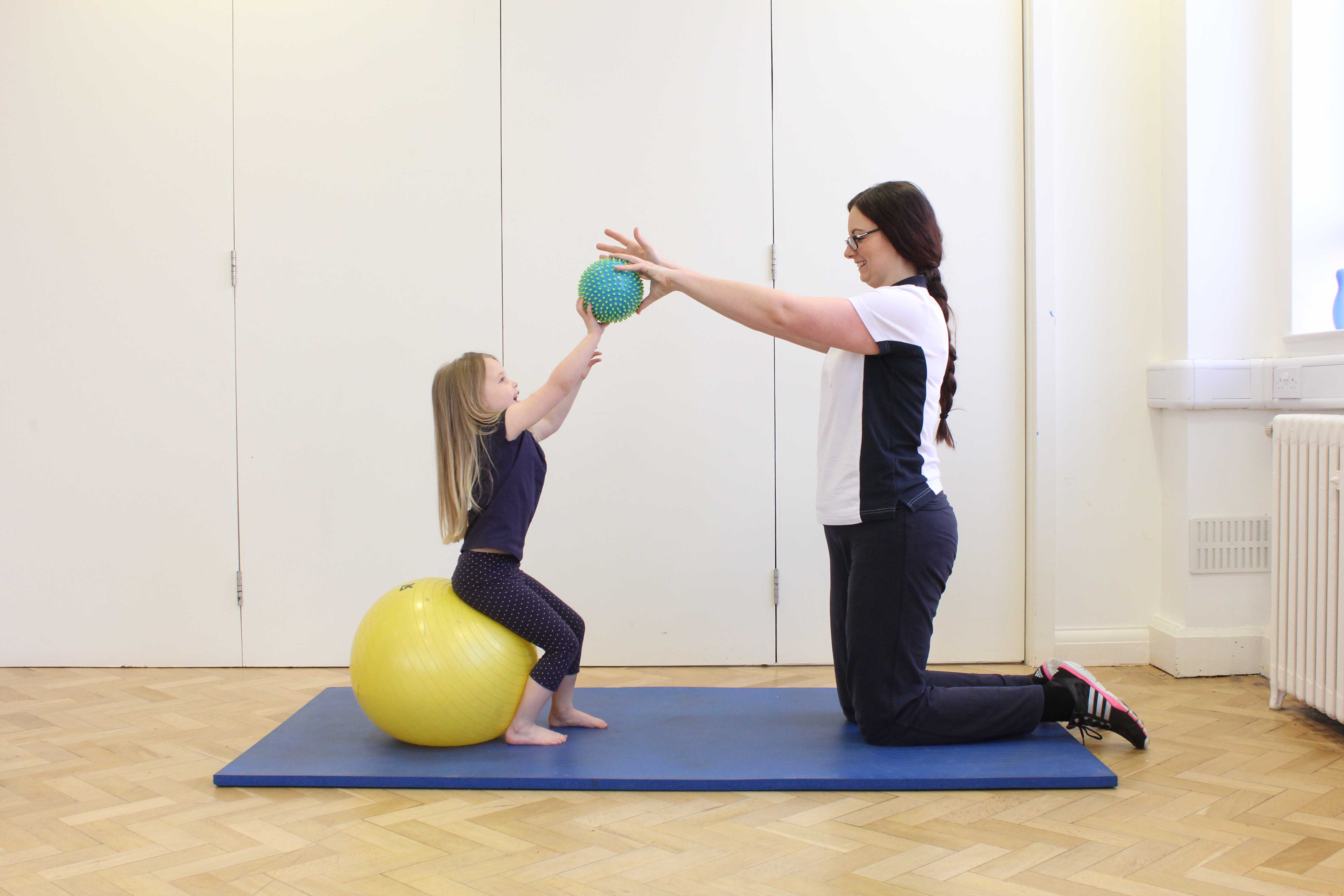 Mobility exercisesusing a wheeled walking frame supervised by a Paediatric Physiotherapist