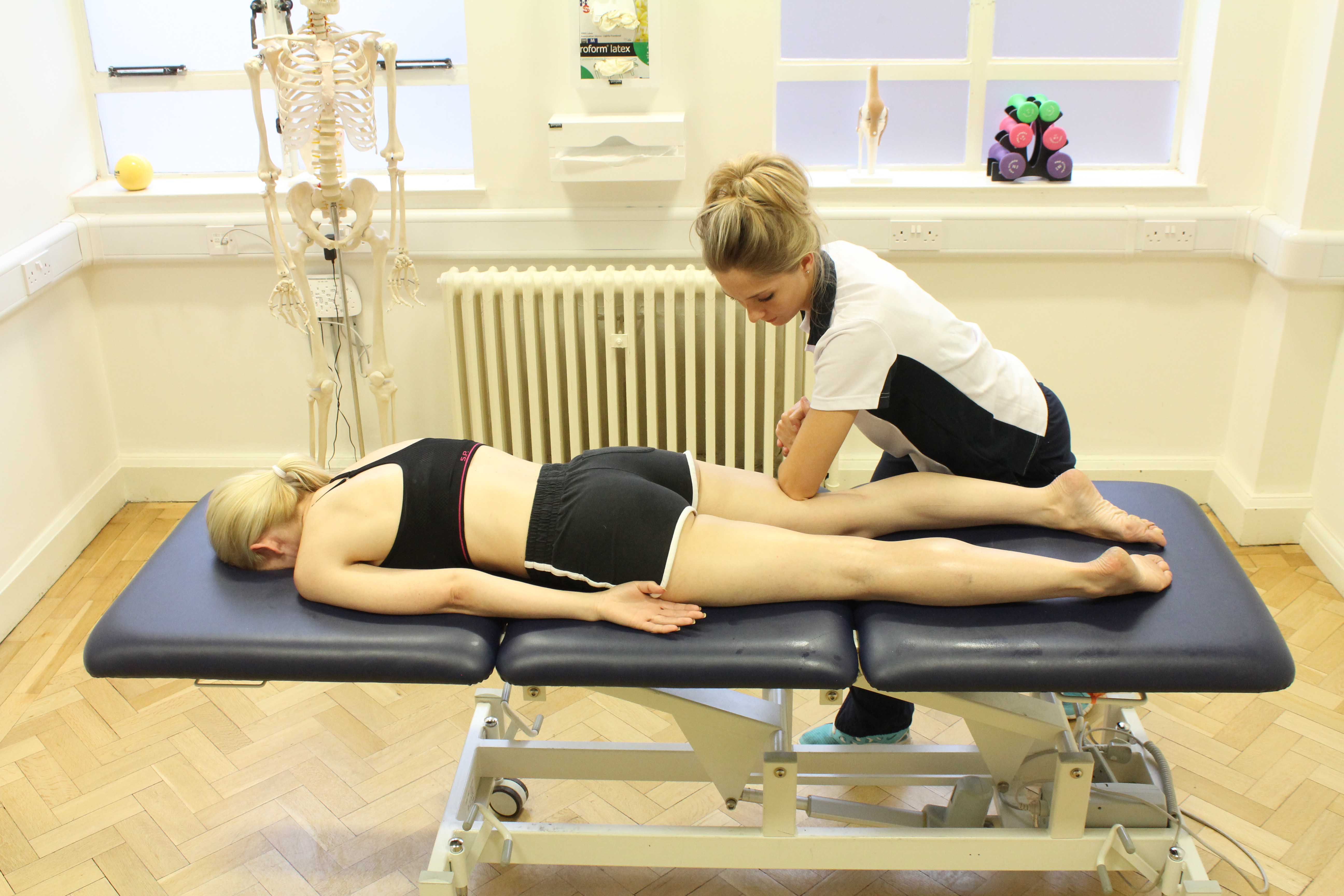 Specialist MSK therapist performing deep tissue massage to relieve pain and stiffness