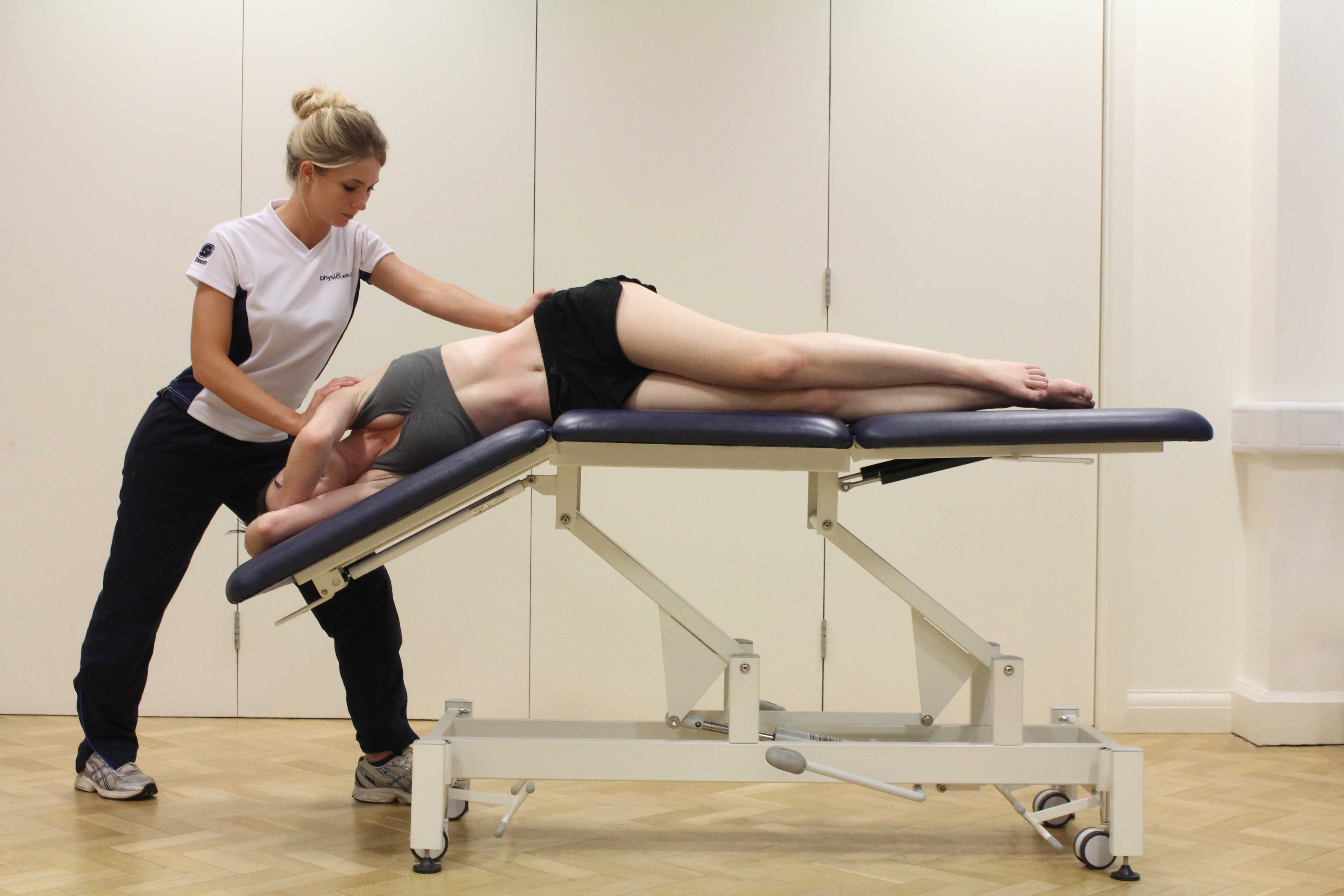 Postural drainage and chest clearence exercises assisted by a specilaist therapist Postural drainage and chest clearence exercises assisted by a specilaist therapist