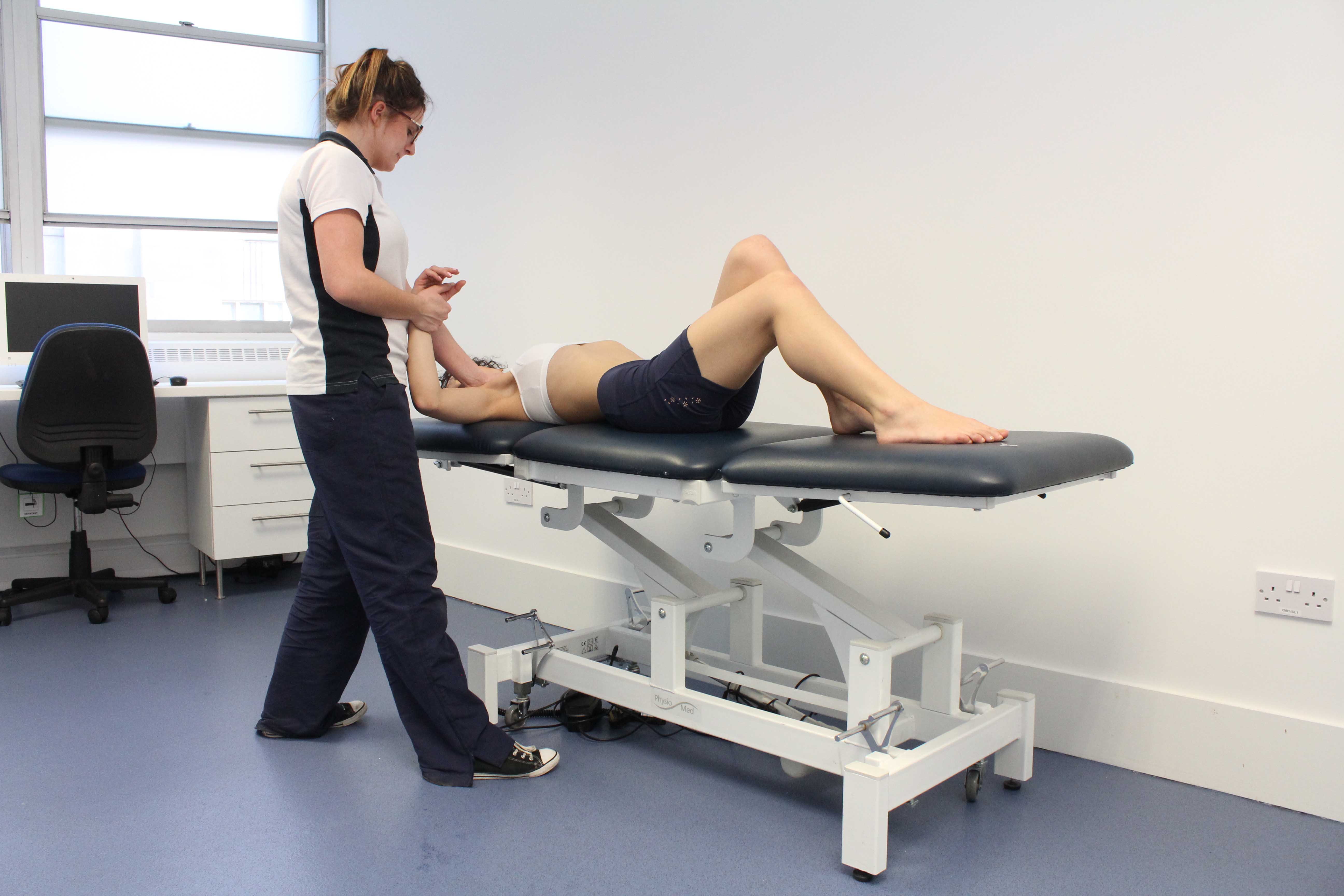 Passive stretches and mobilisations of the elbow by MSK therapist Passive stretches and mobilisations of the elbow by MSK therapist