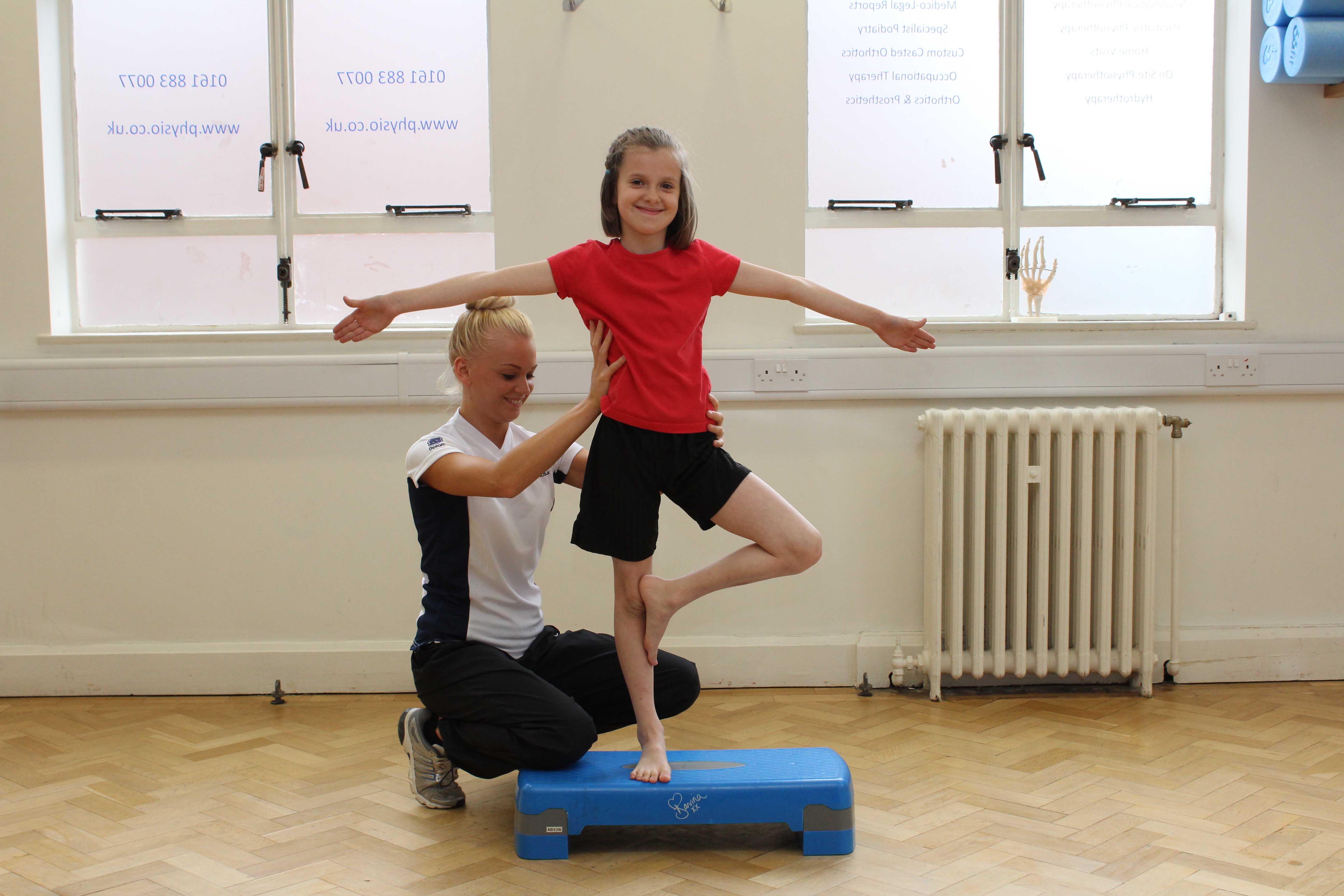 Our physiotherpaist supporting with her balance and strength following an orthopaedic procedure.