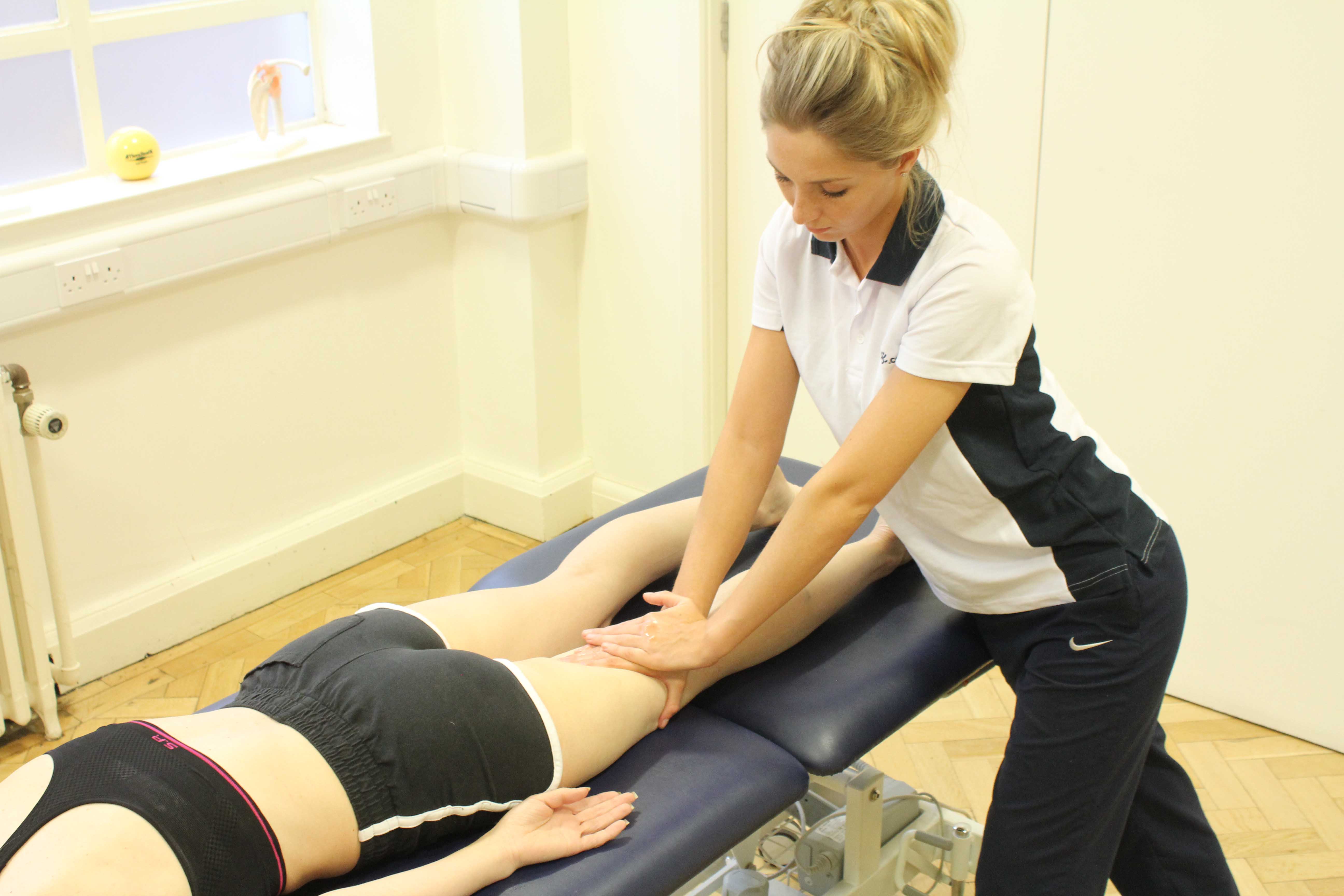 Deep tissue massage of bicep femoris as part of sports training programme Deep tissue massage of bicep femoris as part of sports training programme