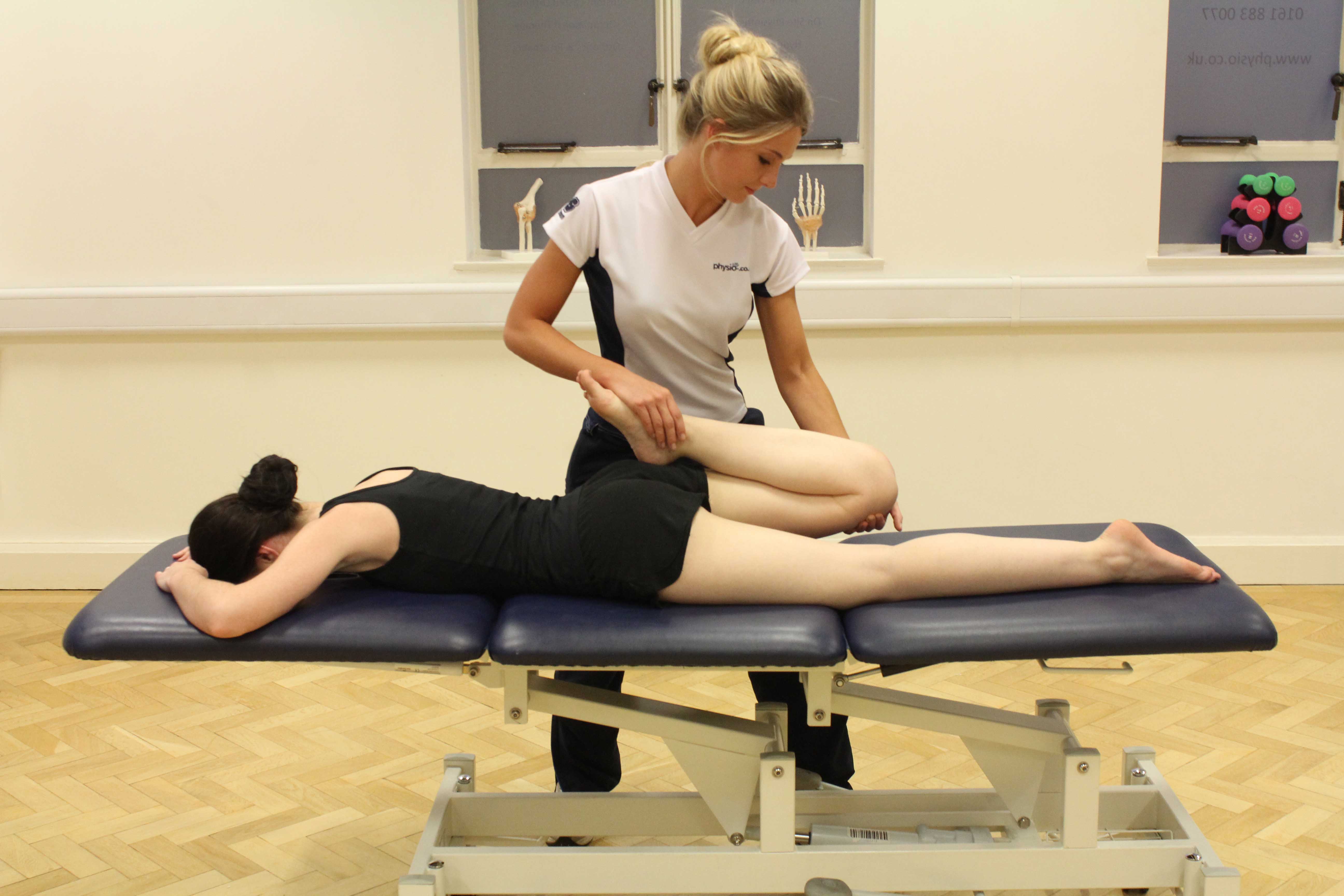 Passive stretch of the knee joint by a MSK therapist Passive stretch of the knee joint by a MSK therapist