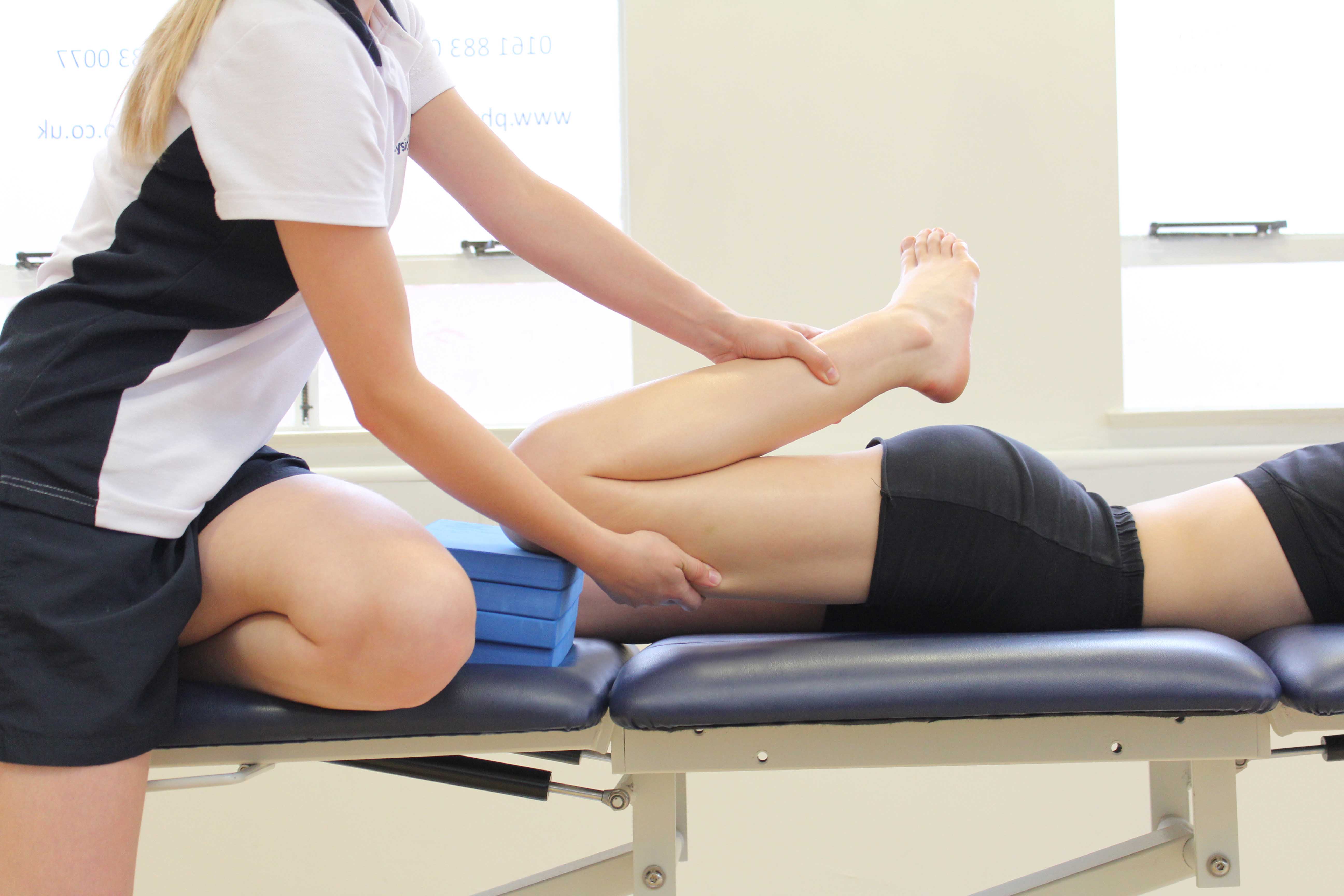 Passive stretch of the muscles and connective tissues of the hip and pelvis by specialist therapist Passive stretch of the muscles and connective tissues of the hip and pelvis by specialist therapist
