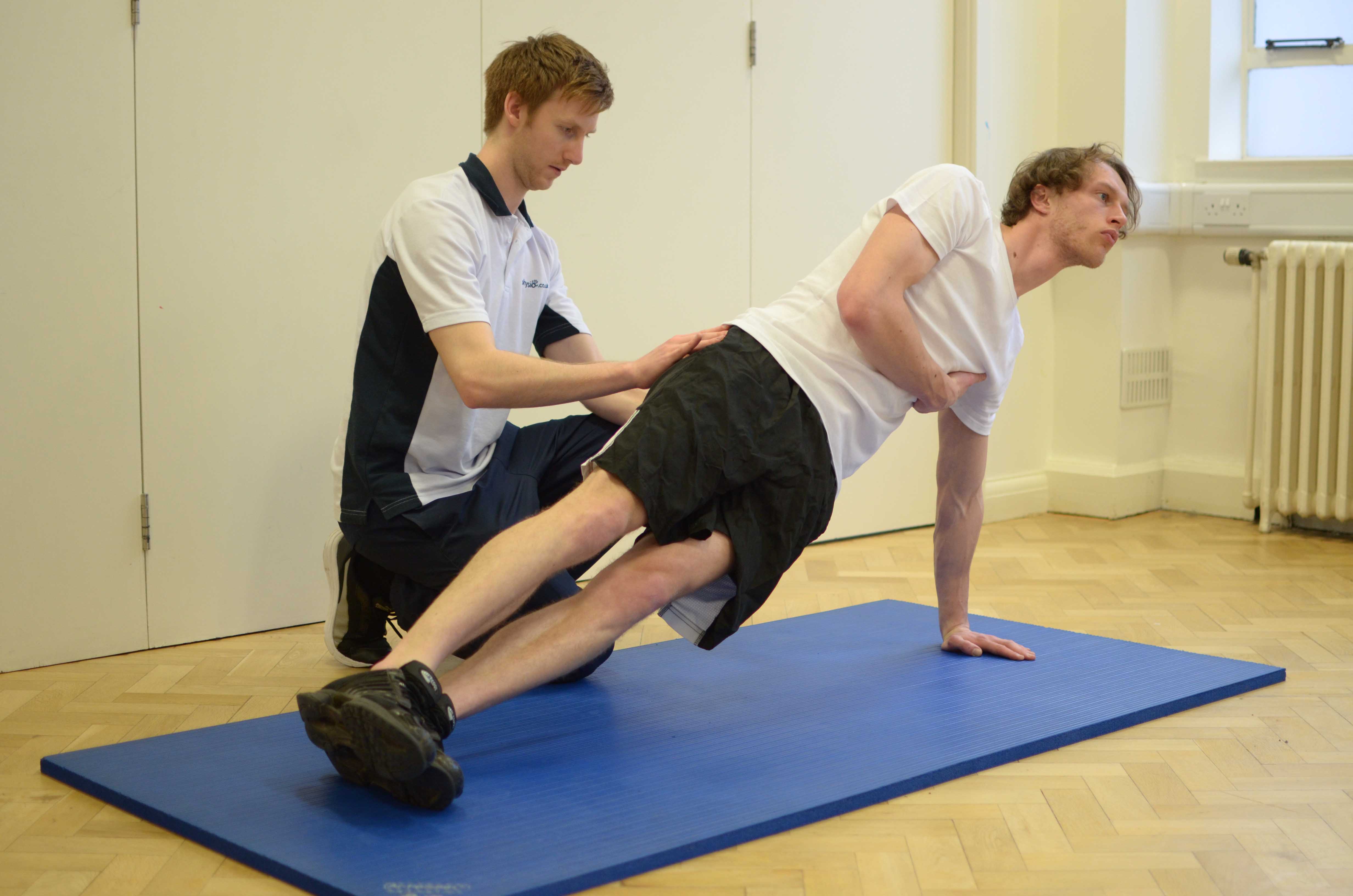 Strengthening exercises for the hip and pelvic muscles, supervised by MSK therapist