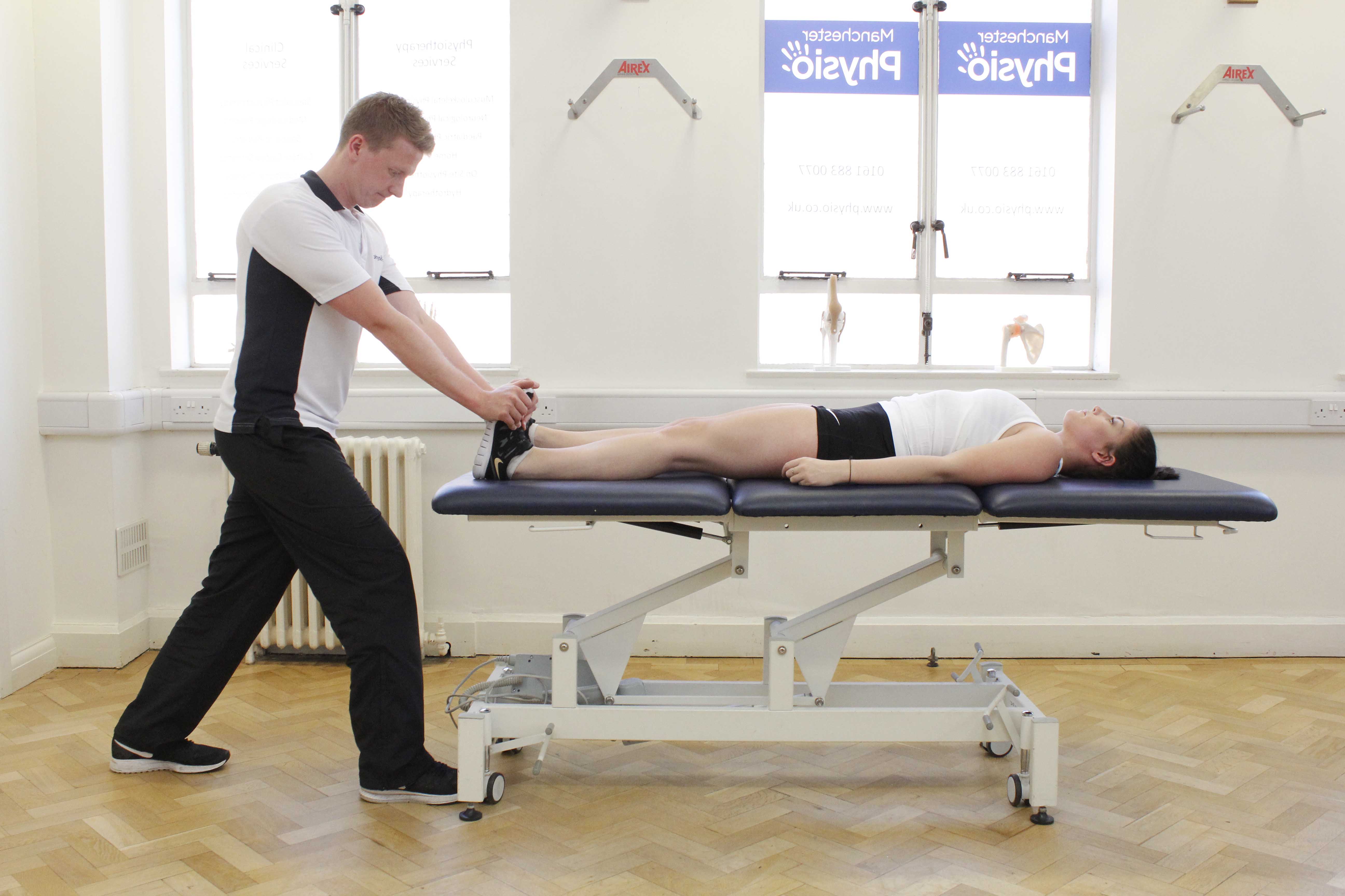 Passive stretch of the achilles tendon performed by specialist therapist