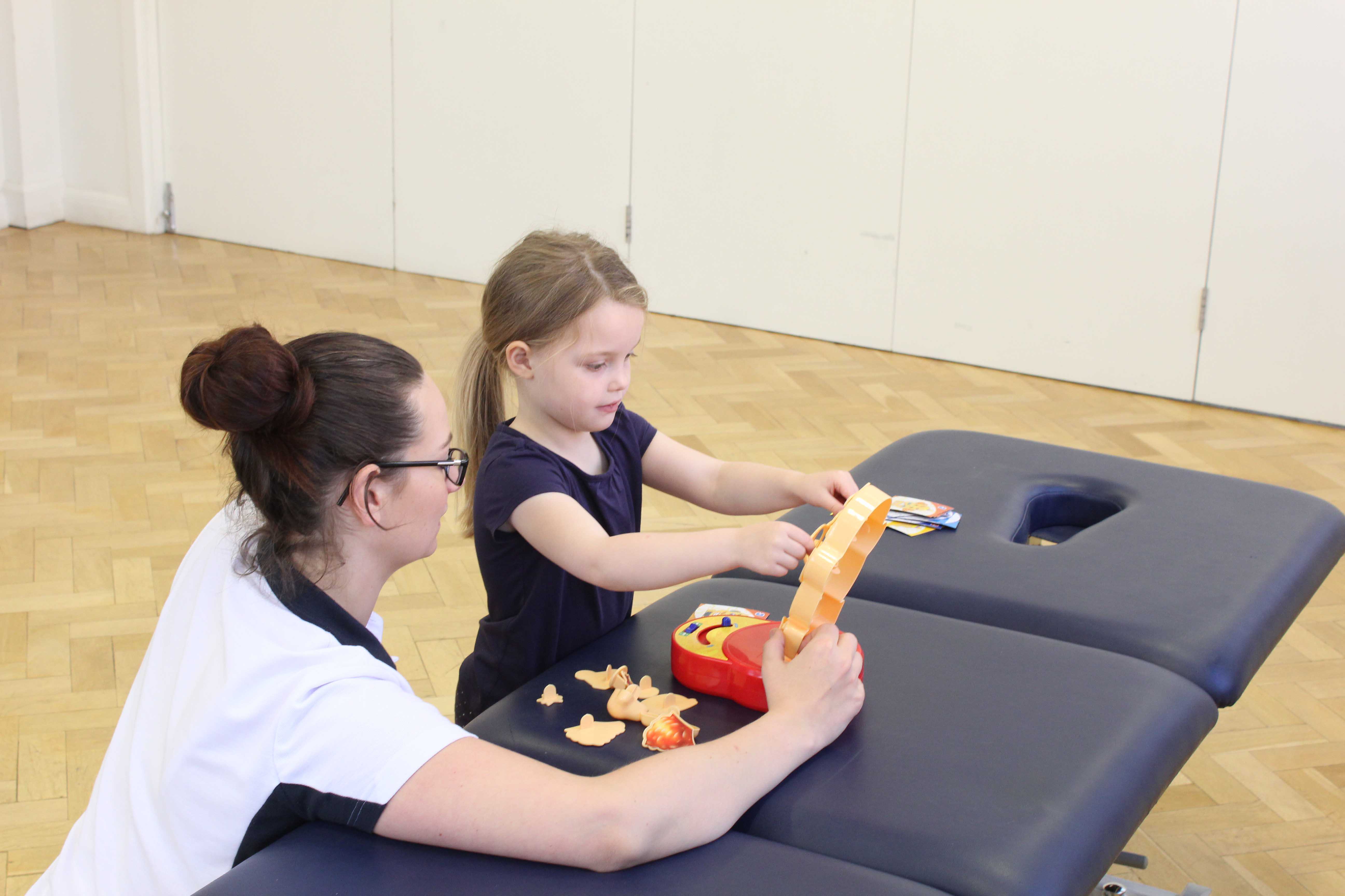Functional fine motor skills practiced under supervision of a neurological physiotherapist Functional fine motor skills practiced under supervision of a neurological physiotherapist