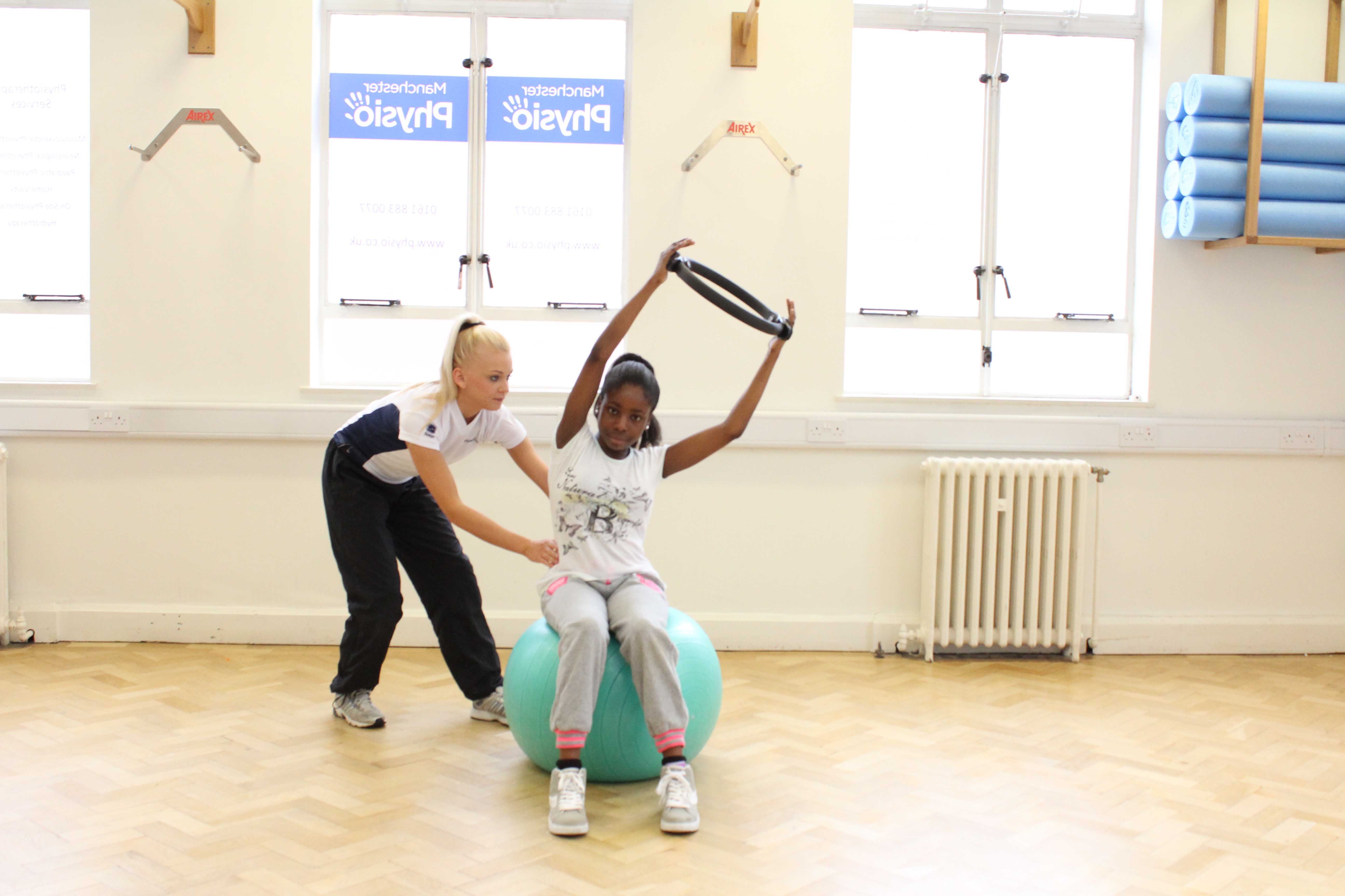 Core stability and stretching exercises supervised by a paediatric physiotherapist