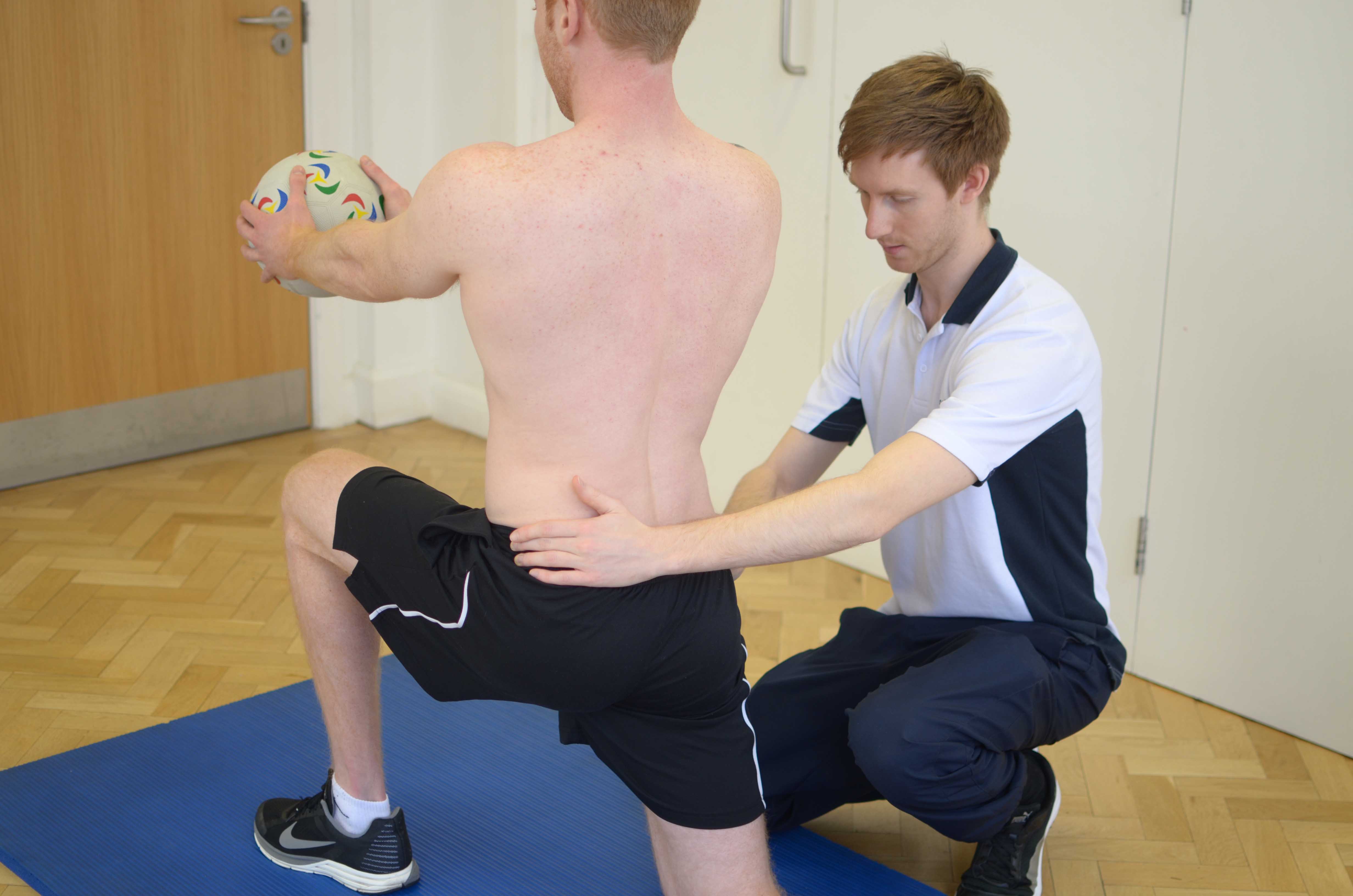 Progressive strengthening exercises for the lower back supervised by specialist MSK physiotherapist