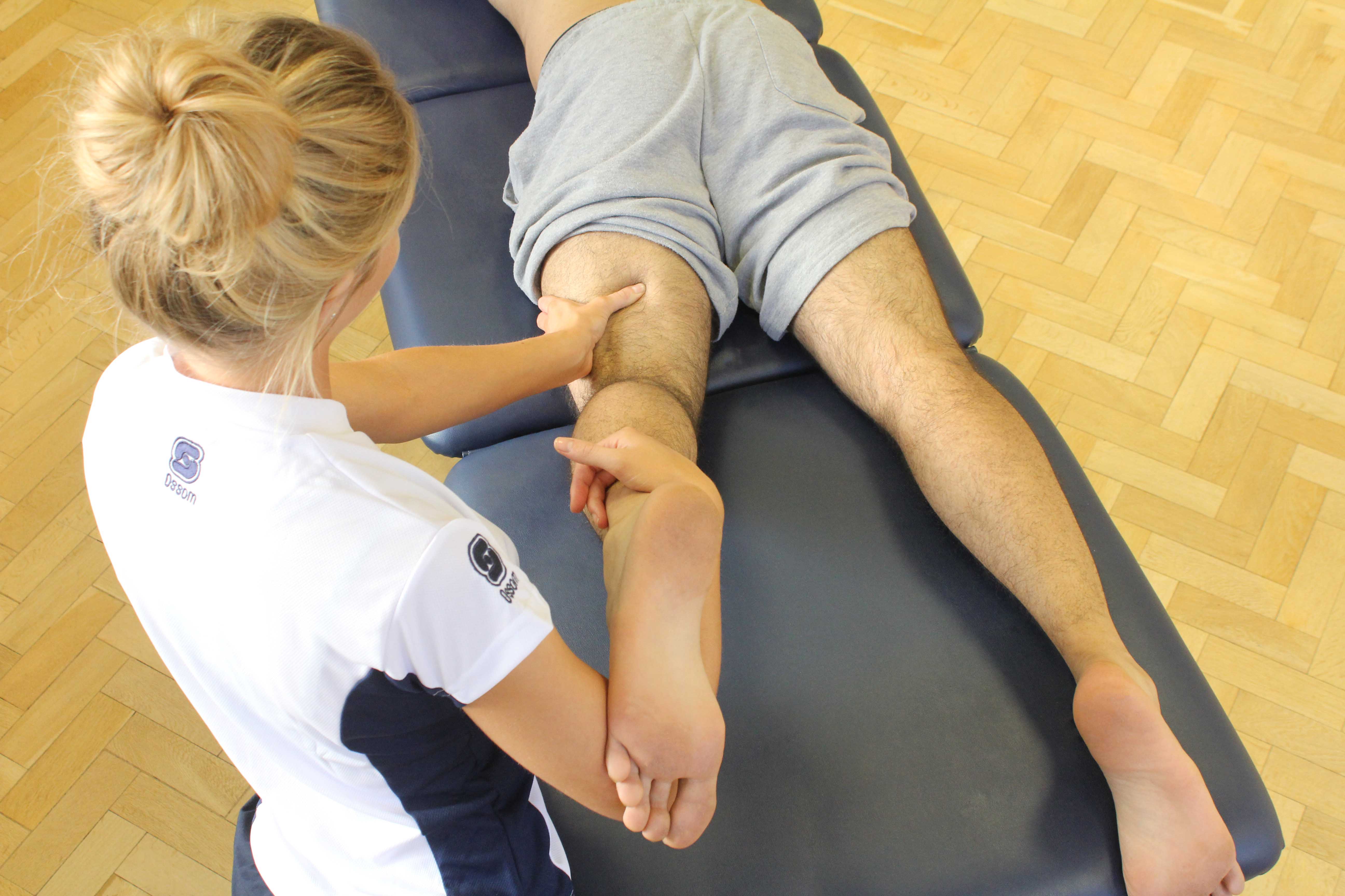 Trigger point massage of the hamstring muscles by an experienced MSK therapist