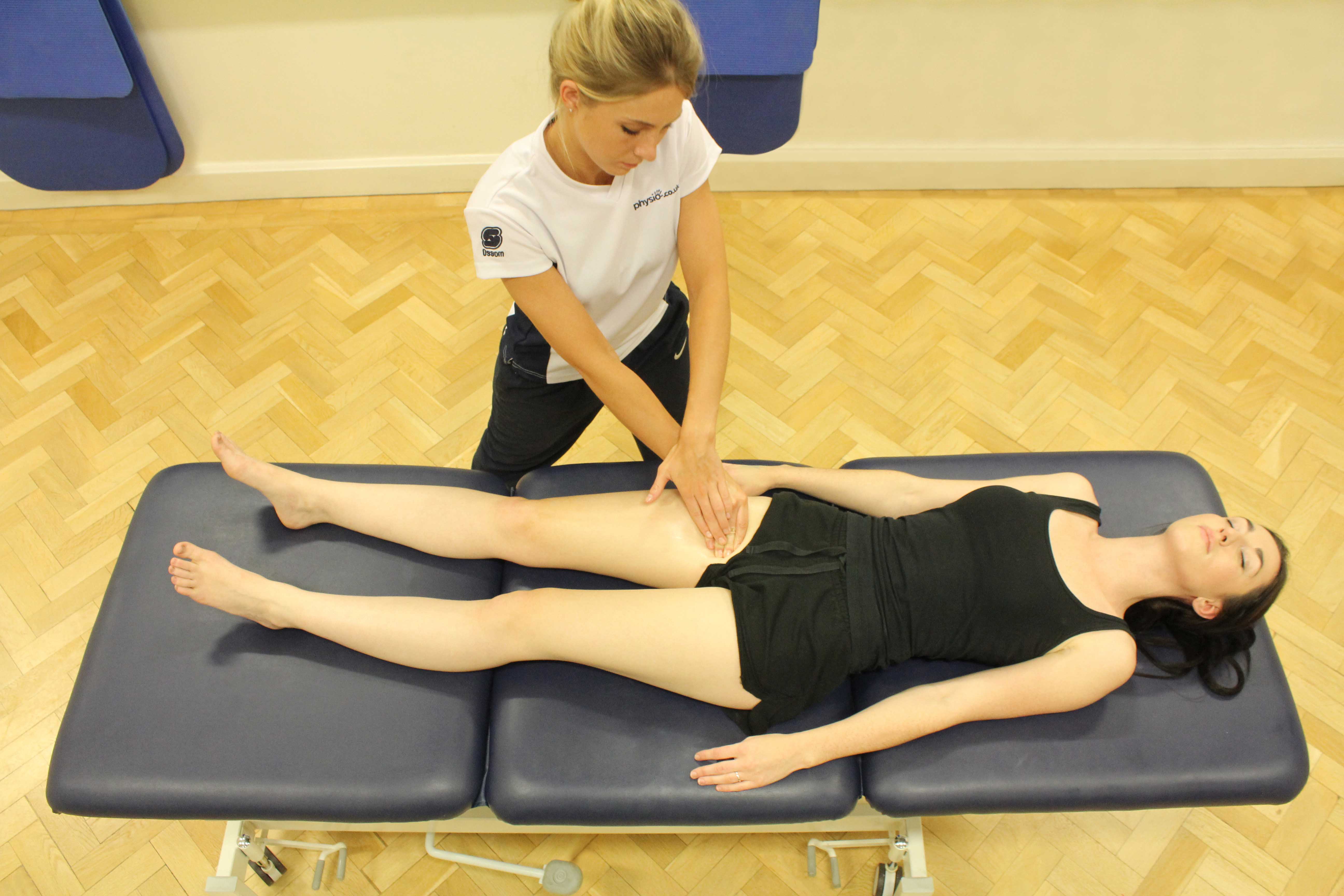 Soft tissue massage of the quadricep muscles by a specialist MSK therapist