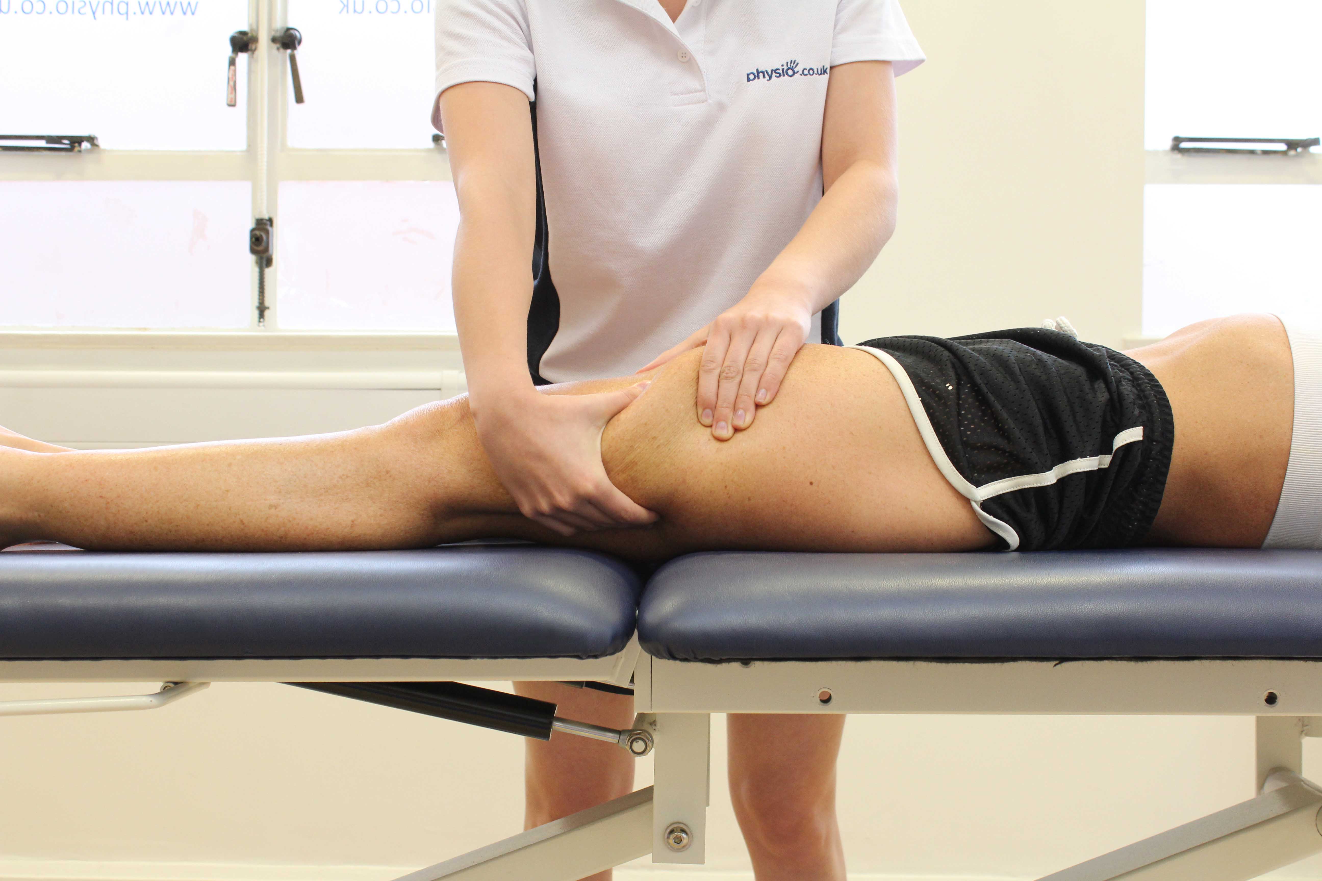 Rolling soft tissue massage of the quadricep muscles Rolling soft tissue massage of the quadricep muscles