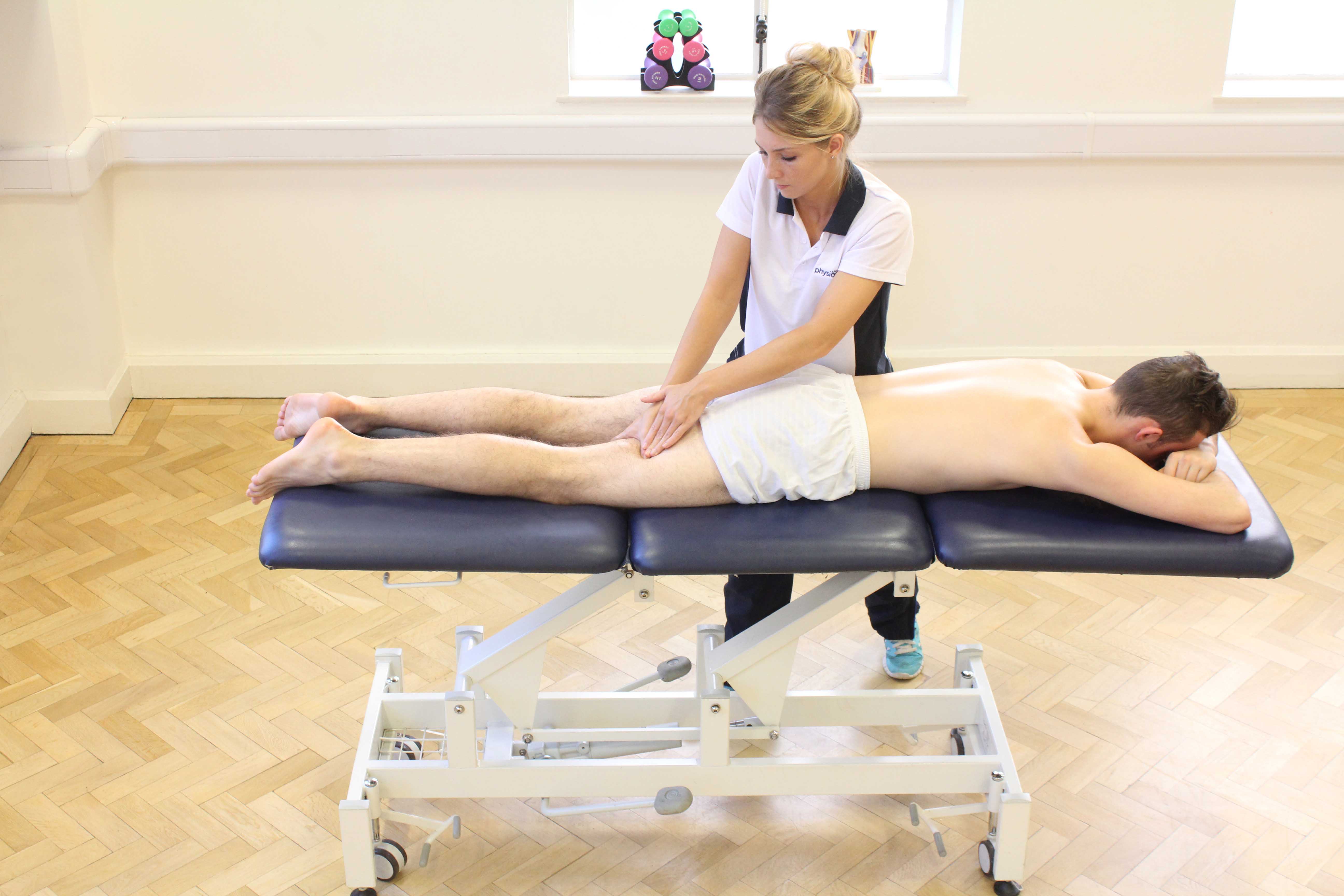 Trigger point massage of the hamstring muscles by an experienced MSK therapist Trigger point massage of the hamstring muscles by an experienced MSK therapist